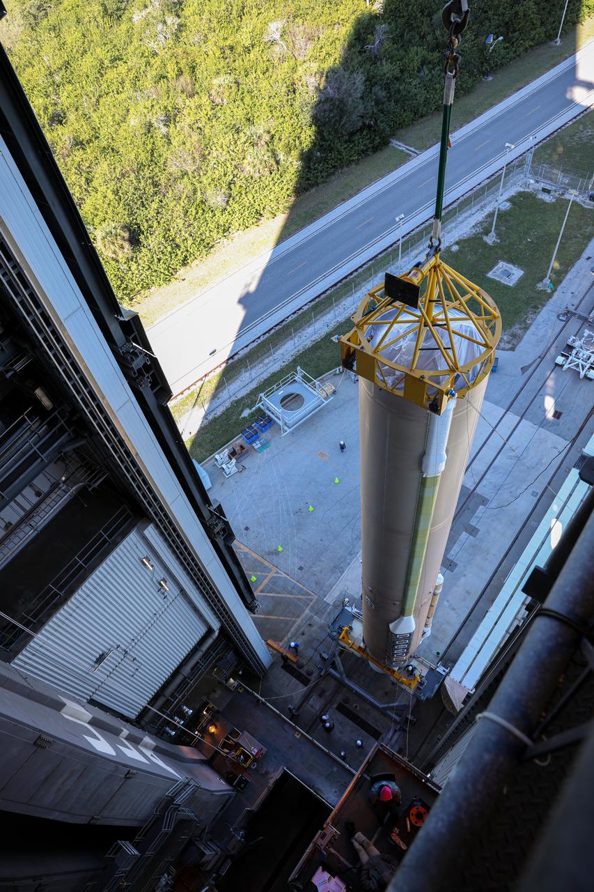 The booster of a United Launch Alliance Atlas V rocket that will launch the Solar Orbiter spacecraft is lifted into the vertical position at the Vertical Integration Facility near Space Launch Complex 41 at Cape Canaveral Air Force Station in Florida on Jan. 6, 2020. Solar Orbiter is an international cooperative mission between ESA (European Space Agency) and NASA. The mission aims to study the Sun, its outer atmosphere and solar wind. The spacecraft will provide the first images of the Sun’s poles. NASA’s Launch Services Program based at Kennedy Space Center in Florida is managing the launch.