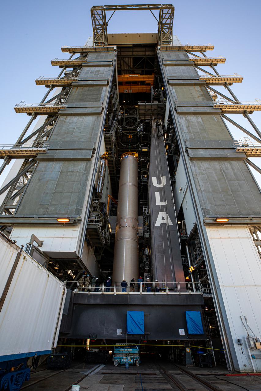 The booster of a United Launch Alliance Atlas V rocket that will launch the Solar Orbiter spacecraft stands inside the Vertical Integration Facility near Space Launch Complex 41 at Cape Canaveral Air Force Station in Florida on Jan. 6, 2020. Solar Orbiter is an international cooperative mission between ESA (European Space Agency) and NASA. The mission aims to study the Sun, its outer atmosphere and solar wind. The spacecraft will provide the first images of the Sun’s poles. NASA’s Launch Services Program based at Kennedy Space Center in Florida is managing the launch.