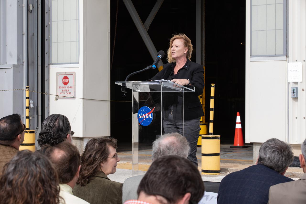 Kathleen Ruvarac, History and Heritage Committee chairperson with the American Society of Civil Engineers (ASCE), speaks to attendees during a ceremony on Jan. 10, 2020, to recognize the Vehicle Assembly Building with the National Historic Civil Engineering Landmark award. The Florida Section ASCE nominated the historic building and bestowed the award. The VAB is the first building at Kennedy Space Center to earn this distinction. At the time of its completion, the 129-million-cubic-foot structure was the largest building in the world. Originally designed and built to accommodate the Saturn V/Apollo used in Project Apollo, the VAB was later modified for its role in the Space Shuttle Program.