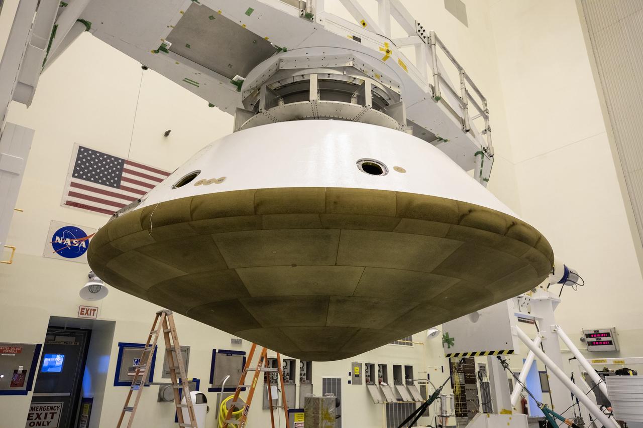The Mars 2020 rover heat shield is mated to the back shell in the Payload Hazardous Servicing Facility at Kennedy Space Center in Florida on Jan. 10, 2020. Built by Lockheed Martin Space, the heat shield and back shell will protect the rover during its passage to Mars. The Mars 2020 rover is being manufactured at NASA’s Jet Propulsion Laboratory (JPL) in California and, once complete, will be delivered to Kennedy next month. The mission is scheduled to launch from Cape Canaveral Air Force Station in Florida in the summer of 2020.