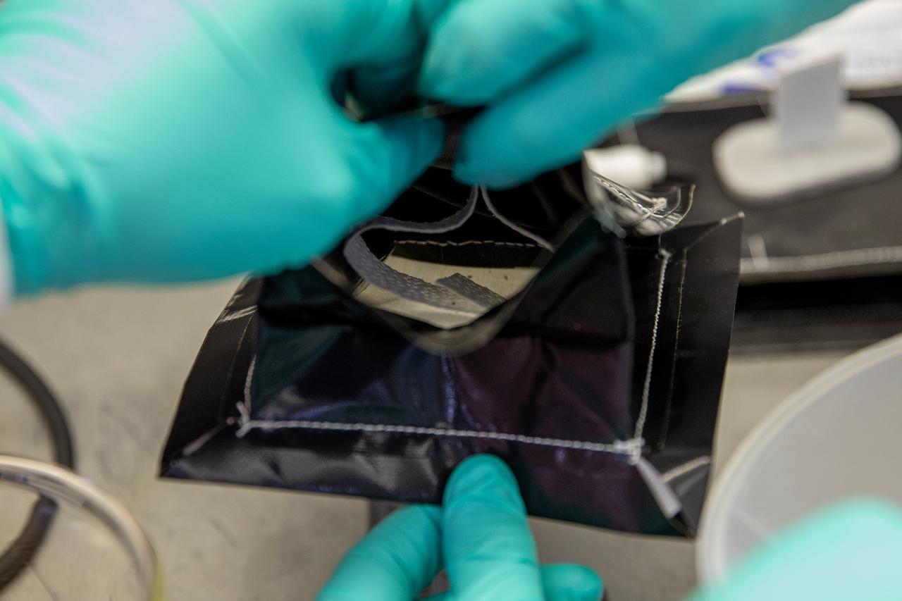 Researchers at NASA’s Kennedy Space Center in Florida assemble plant pillows inside the Space Station Processing Facility on Jan. 16, 2020. The pillows, which are a common method used to grow plants in space, are being sent to the International Space Station for a series of VEG-03 experiments that will study the growth of three types of leafy greens and a new seed handling technology in a microgravity environment. The experiments will be launched to the orbiting laboratory aboard a Northrop Grumman Antares rocket and Cygnus spacecraft on the company’s 13th resupply services mission. Liftoff is scheduled for Feb. 9, 2020, at 5:39 p.m. EST from the agency’s Wallops Flight Facility in Virginia.