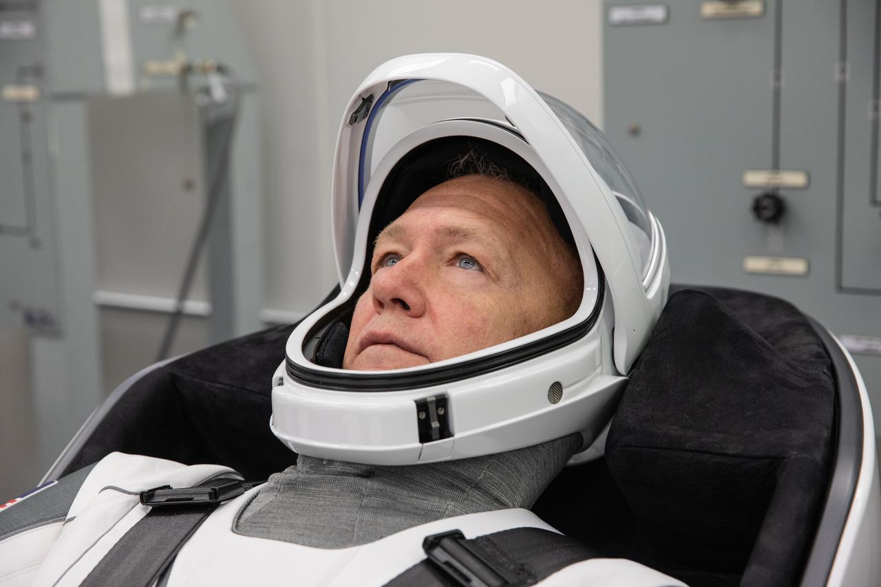 NASA astronaut Doug Hurley dons a SpaceX spacesuit in the Astronaut Crew Quarters at Kennedy Space Center in Florida on Jan. 17, 2020, during a dress rehearsal ahead of the company’s uncrewed In-Flight Abort Test. A SpaceX Falcon 9 rocket and Crew Dragon spacecraft will lift off from Launch Complex 39A on the flight test, which will demonstrate the spacecraft’s escape capabilities in preparation for crewed flights to the International Space Station as part of the agency’s Commercial Crew Program. Hurley and NASA astronaut Bob Behnken are slated to fly on the company’s first crewed mission, Demo-2.