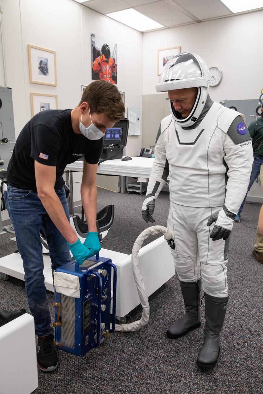 NASA astronaut Doug Hurley wears a SpaceX spacesuit in the Astronaut Crew Quarters at Kennedy Space Center in Florida on Jan. 17, 2020, during a dress rehearsal ahead of the company’s uncrewed In-Flight Abort Test. A SpaceX Falcon 9 rocket and Crew Dragon spacecraft will lift off from Launch Complex 39A on the flight test, which will demonstrate the spacecraft’s escape capabilities in preparation for crewed flights to the International Space Station as part of the agency’s Commercial Crew Program. Hurley and NASA astronaut Bob Behnken are slated to fly on the company’s first crewed mission, Demo-2.