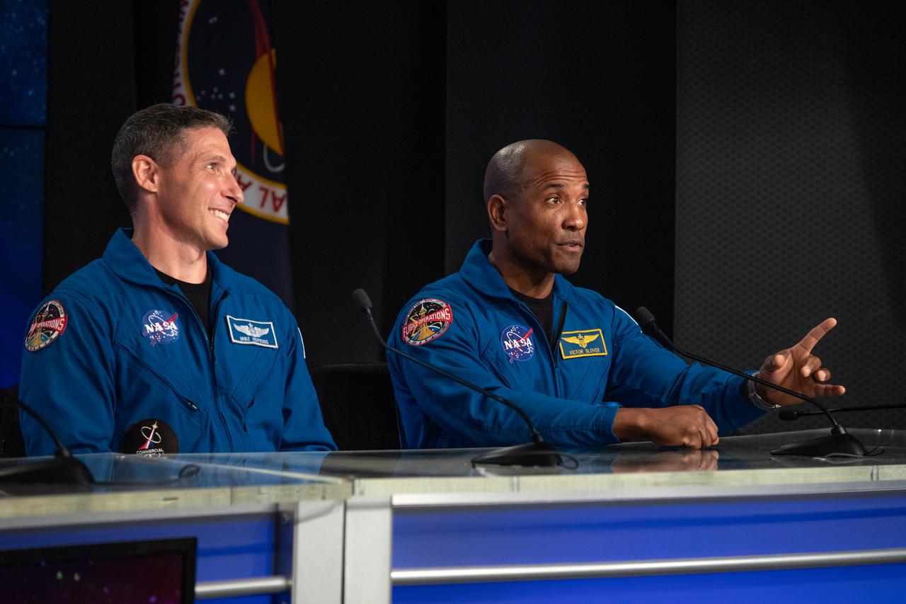 NASA astronaut Victor Glover, right, speaks during a briefing at the agency’s Kennedy Space Center in Florida following the uncrewed In-Flight Abort Test on Jan. 19, 2020. Beside Glover is NASA astronaut Mike Hopkins. During the flight test, a SpaceX Falcon 9 rocket and Crew Dragon spacecraft lifted off from Kennedy’s Launch Complex 39A and began a planned launch-abort sequence demonstrating the spacecraft’s escape capabilities. The Crew Dragon splashed down in the Atlantic Ocean as expected. The In-Flight Abort Test is a critical milestone in preparation for crewed flights to the International Space Station as part of the agency’s Commercial Crew Program.