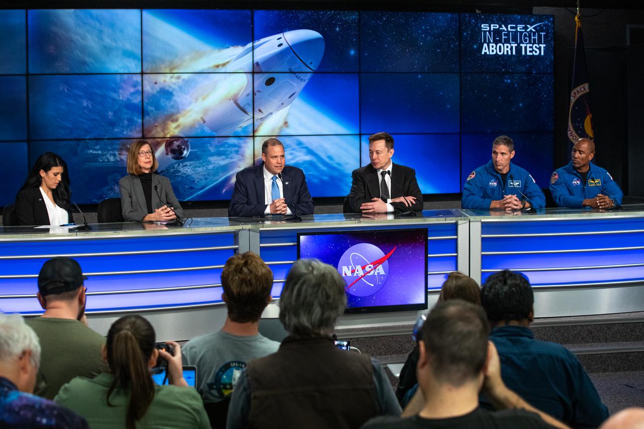 Officials from NASA and SpaceX participate in a briefing at the agency’s Kennedy Space Center in Florida following the company’s uncrewed In-Flight Abort Test on Jan. 19, 2020. From left to right are Bettina Inclan, NASA Communications; Kathy Lueders, program manager, NASA’s Commercial Crew Program; NASA Administrator Jim Bridenstine; Elon Musk, chief engineer, SpaceX; and NASA astronauts Mike Hopkins and Victor Glover. During the flight test, a SpaceX Falcon 9 rocket and Crew Dragon spacecraft lifted off from Kennedy’s Launch Complex 39A and began a planned launch-abort sequence demonstrating the spacecraft’s escape capabilities. The Crew Dragon splashed down in the Atlantic Ocean as expected. The In-Flight Abort Test is a critical milestone in preparation for crewed flights to the International Space Station as part of the agency’s Commercial Crew Program.