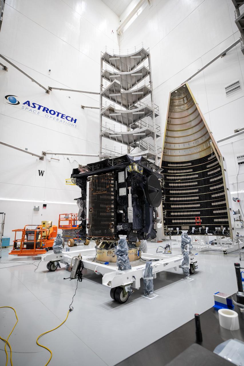 One half of a United Launch Alliance Atlas V payload fairing is positioned for installation around the Solar Orbiter spacecraft inside the Astrotech Space Operations facility in Titusville, Florida, on Jan. 20, 2020. The fairing provides a protective, aerodynamic covering to the payload inside during the early minutes of ascent. Solar Orbiter is an international cooperative mission between ESA (European Space Agency) and NASA. The mission aims to study the Sun, its outer atmosphere and solar wind. The spacecraft will provide the first images of the Sun’s poles. NASA’s Launch Services Program based at Kennedy Space Center in Florida is managing the launch. The spacecraft has been developed by Airbus Defence and Space. Solar Orbiter will launch aboard an Atlas V rocket from Space Launch Complex 41 at Cape Canaveral Air Force Station in Florida. Liftoff is scheduled for Feb. 5, 2020.