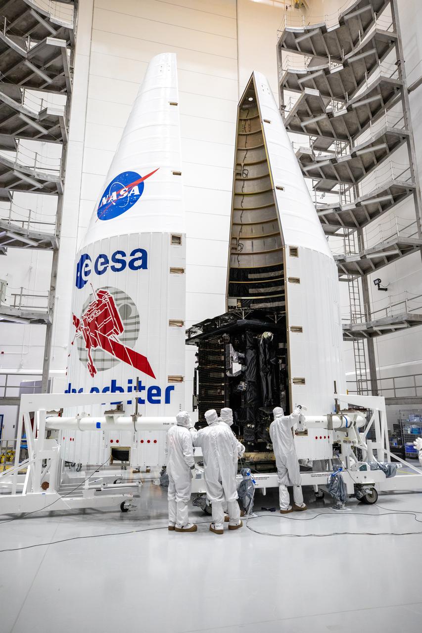 Both halves of a United Launch Alliance Atlas V payload fairing come together around the Solar Orbiter spacecraft inside the Astrotech Space Operations facility in Titusville, Florida, on Jan. 20, 2020. The fairing provides a protective, aerodynamic cover to the payload inside during the early minutes of ascent. Solar Orbiter is an international cooperative mission between ESA (European Space Agency) and NASA. The mission aims to study the Sun, its outer atmosphere and solar wind. The spacecraft will provide the first images of the Sun’s poles. NASA’s Launch Services Program based at Kennedy Space Center in Florida is managing the launch. The spacecraft has been developed by Airbus Defence and Space. Solar Orbiter will launch aboard an Atlas V rocket from Space Launch Complex 41 at Cape Canaveral Air Force Station in Florida. Liftoff is scheduled for Feb. 5, 2020.