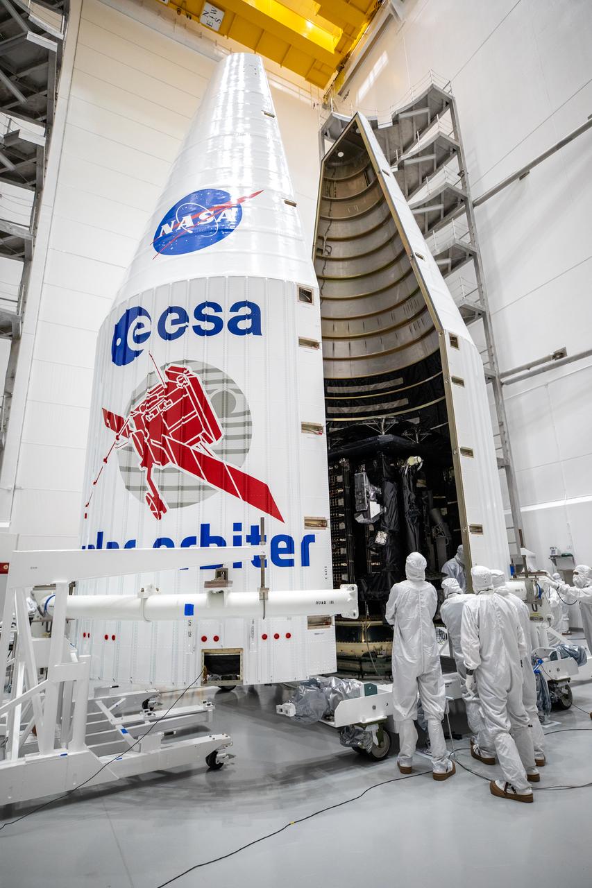 Both halves of a United Launch Alliance Atlas V payload fairing come together around the Solar Orbiter spacecraft inside the Astrotech Space Operations facility in Titusville, Florida, on Jan. 20, 2020. The fairing provides a protective, aerodynamic cover to the payload inside during the early minutes of ascent. Solar Orbiter is an international cooperative mission between ESA (European Space Agency) and NASA. The mission aims to study the Sun, its outer atmosphere and solar wind. The spacecraft will provide the first images of the Sun’s poles. NASA’s Launch Services Program based at Kennedy Space Center in Florida is managing the launch. The spacecraft has been developed by Airbus Defence and Space. Solar Orbiter will launch aboard an Atlas V rocket from Space Launch Complex 41 at Cape Canaveral Air Force Station in Florida. Liftoff is scheduled for Feb. 5, 2020.