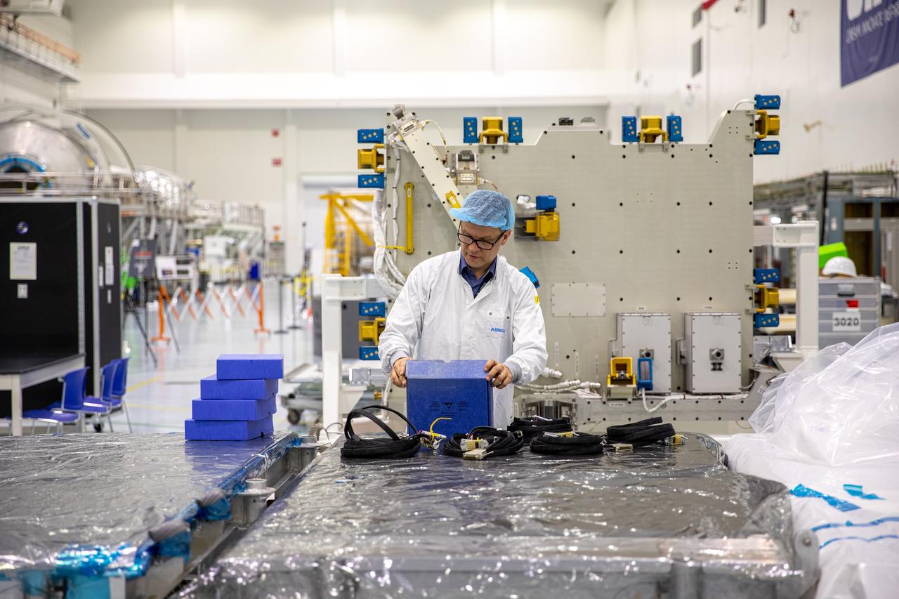 Airbus workers inspects parts for the Bartolomeo platform after it was unpacked from its shipping container in the Space Station Processing Facility high bay at NASA’s Kennedy Space Center in Florida on Jan. 30, 2020. Bartolomeo was manufactured by Airbus Defence and Space. The platform will be delivered to the International Space Station aboard SpaceX’s 20th Commercial Resupply Services (CRS-20) mission for the agency. The platform will attach to the exterior of the space station’s European Columbus Module. Named for the younger brother of Christopher Columbus, the platform has the capability to host external payloads in low-Earth orbit on the station. CRS-20 is scheduled to launch aboard SpaceX’s Dragon cargo spacecraft atop the company’s Falcon 9 rocket in March 2020.