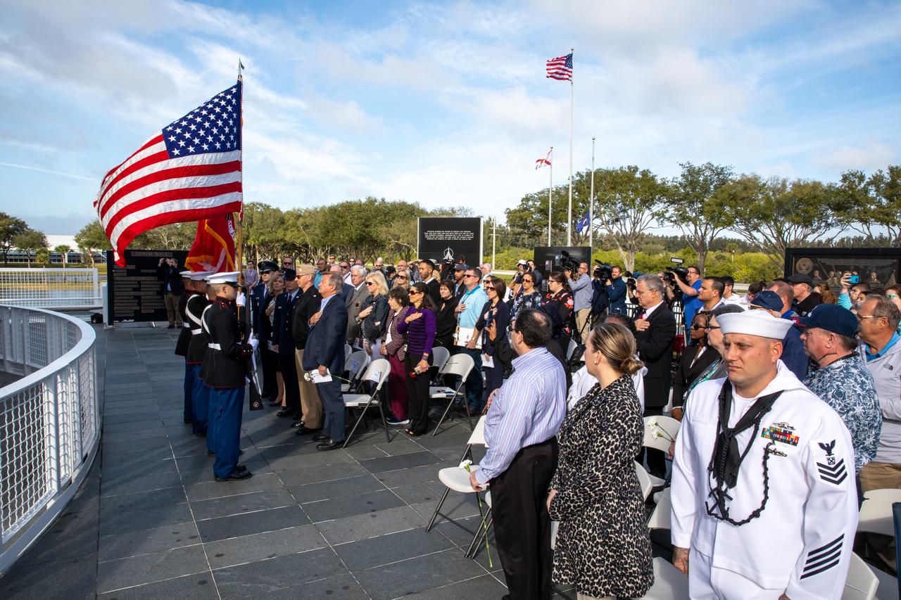 Members of the Palm Bay Magnet High School Marine Corps JROTC participate in the presentation of colors during the NASA Day of Remembrance ceremony at the Space Mirror Memorial in the Kennedy Space Center Visitor Complex on Jan. 30, 2020. The crews of Apollo 1 and space shuttles Challenger and Columbia, as well as other fallen astronauts who lost their lives in the name of space exploration and discovery, were honored at the annual event.