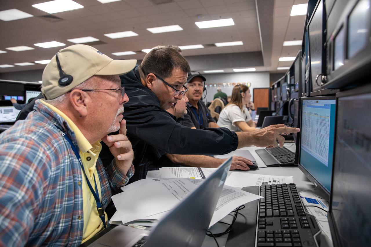 From left to right, Joe Novitsky, Martin Schnetzer, Troy Akseraylian and Will Booker, environmental control systems engineers at NASA’s Kennedy Space Center in Florida, participate in a launch countdown simulation on Feb. 3, 2020, inside the Launch Control Center’s Firing Room 1. Under the leadership of Launch Director Charlie Blackwell-Thompson, a team of nearly 100 engineers from Orion, Space Launch System (SLS) and NASA’s Exploration Ground Systems came together to work through a series of simulated challenges, as well as a final countdown procedure, in preparation for the Artemis I launch. During these exercises, different issues were introduced to familiarize the team with launch day operations, while providing them with an opportunity to practice how they would handle those issues in real-time. Artemis I will be the first integrated test flight of the Orion spacecraft and SLS rocket – the system that will ultimately land the first woman and the next man on the Moon. 