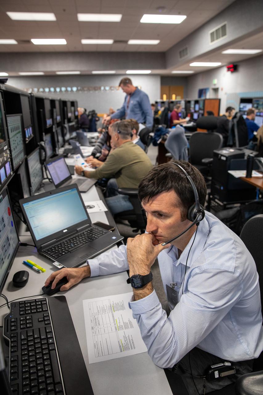 Billy Mitchell, a hazardous gas engineer at NASA’s Kennedy Space Center in Florida, participates in an Artemis I launch countdown training exercise inside Firing Room 1 in the Launch Control Center on Feb. 3, 2020. Under the leadership of Launch Director Charlie Blackwell-Thompson, a team of nearly 100 engineers from Orion, Space Launch System (SLS) and NASA’s Exploration Ground Systems came together to work through a series of simulated challenges, as well as a final countdown procedure. During these exercises, different issues were introduced to familiarize the team with launch day operations, while providing them with an opportunity to practice how they would handle those issues in real-time. Artemis I will be the first integrated test flight of the Orion spacecraft and SLS rocket – the system that will ultimately land the first woman and the next man on the Moon. 
