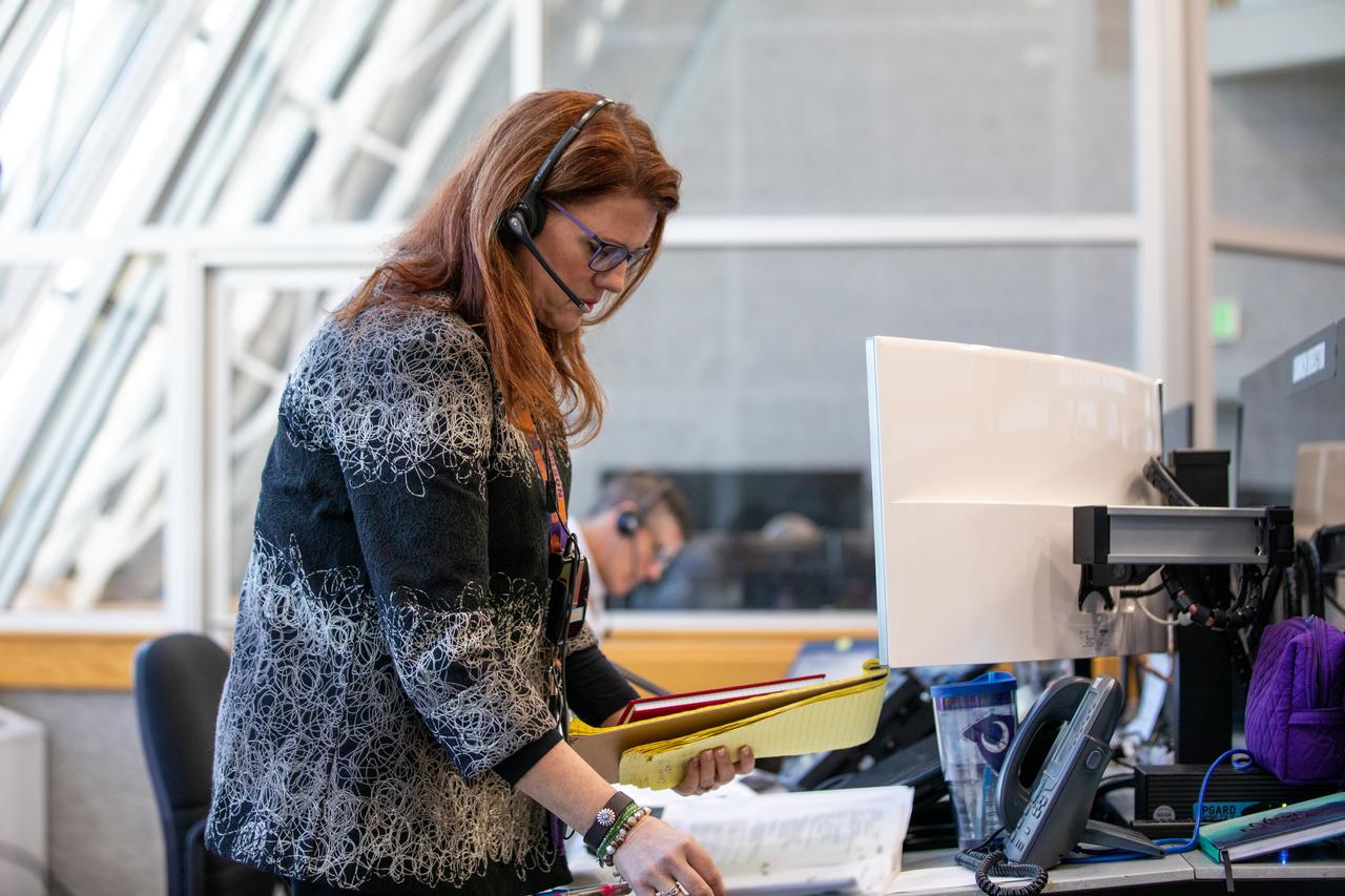Artemis I Launch Director Charlie Blackwell-Thompson stands at her console inside the Launch Control Center’s Firing Room 1 at NASA’s Kennedy Space Center in Florida during launch countdown training. On Feb. 3, 2020, a team of nearly 100 engineers from Orion, Space Launch System (SLS) and the agency’s Exploration Ground Systems came together to work through a series of simulated challenges, as well as a final countdown procedure. During these exercises, different issues were introduced to familiarize the team with launch day operations, while providing them with an opportunity to practice how they would handle those issues in real-time. Artemis I will be the first integrated test flight of the Orion spacecraft and SLS rocket – the system that will ultimately land the first woman and the next man on the Moon. 