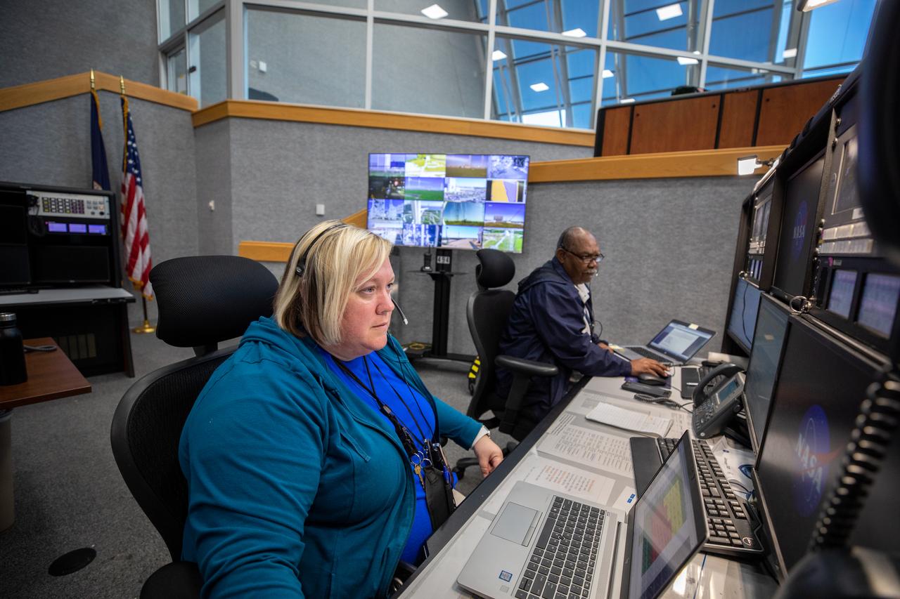 Lisa Devries (left) and Bubba Howard, safety engineers at NASA’s Kennedy Space Center in Florida, participate in a launch countdown simulation inside Firing Room 1 in the Launch Control Center on Feb. 3, 2020. Under the leadership of Artemis I Launch Director Charlie Blackwell-Thompson, a team of nearly 100 engineers from Orion, Space Launch System (SLS) and NASA’s Exploration Ground Systems came together to work through a series of simulated challenges, as well as a final countdown procedure. During these exercises, different issues were introduced to familiarize the team with launch day operations, while providing them with an opportunity to practice how they would handle those issues in real-time. Artemis I will be the first integrated test flight of the Orion spacecraft and SLS rocket – the system that will ultimately land the first woman and the next man on the Moon. 