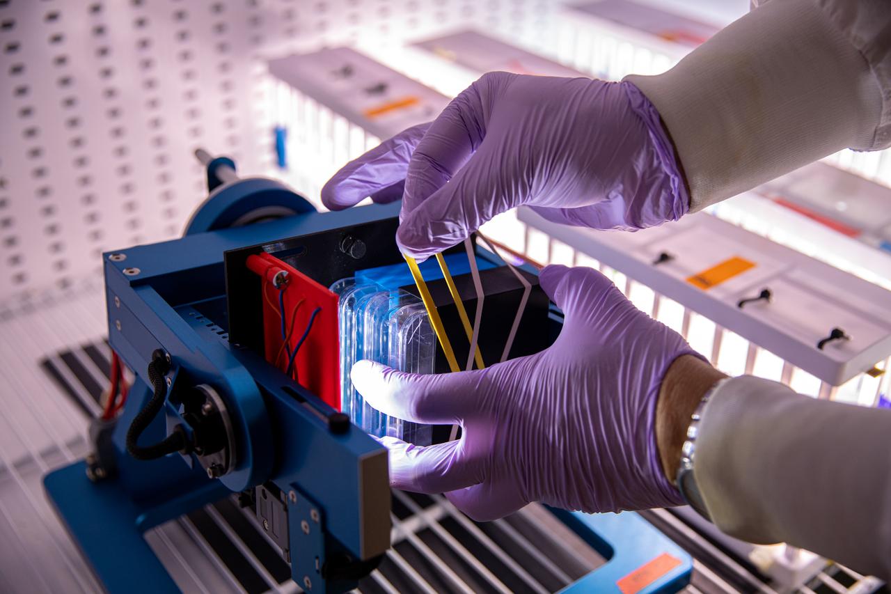 Jeffrey Richards, a payload research and science coordinator on the LASSO contract at NASA’s Kennedy Space Center in Florida, prepares an experiment for a test in an Airbus Random Positioning Machine in the Microgravity Simulation Support Facility (MSSF) inside the Neil Armstrong Operations and Checkout building at NASA’s Kennedy Space Center in Florida on Feb. 11, 2020. The facility was developed to provide ground simulation capability to the U.S. research community in order to supplement the limited opportunities to access the International Space Station and other platforms for microgravity research. The MSSF is designed to support biological research on microorganisms, cells, tissues, small plants and small animals. The simulator provides NASA with an alternative platform for microgravity research and creates the opportunity to conduct experiments on the space station in parallel with conditions of simulated microgravity on the ground.