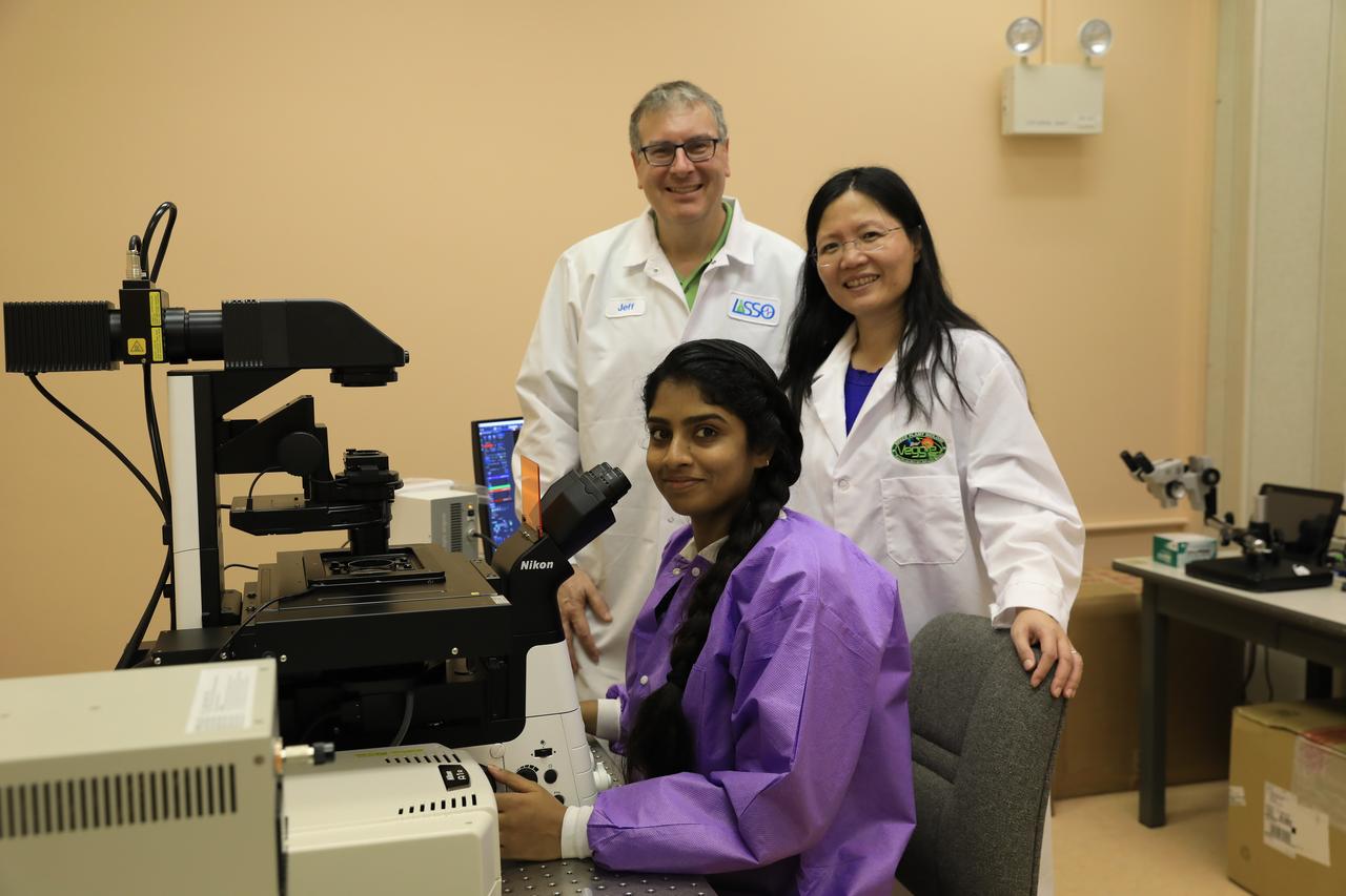 Dr. Srujana Neelam, a NASA post-doctoral fellow observes samples on a confocal microscope in the Microgravity Simulation Support Facility (MSSF) inside the Neil Armstrong Operations and Checkout building at NASA’s Kennedy Space Center in Florida on Feb. 11, 2020 with Jeffrey Richards, a payload research and science coordinator on the LASSO contract, Dr. Ye Zhang, a project scientist. The facility was developed to provide ground simulation capability to the U.S. research community in order to supplement the limited opportunities to access the International Space Station and other platforms for microgravity research. The MSSF is designed to support biological research on microorganisms, cells, tissues, small plants and small animals. The simulator provides NASA with an alternative platform for microgravity research and creates the opportunity to conduct experiments on the space station in parallel with conditions of simulated microgravity on the ground.