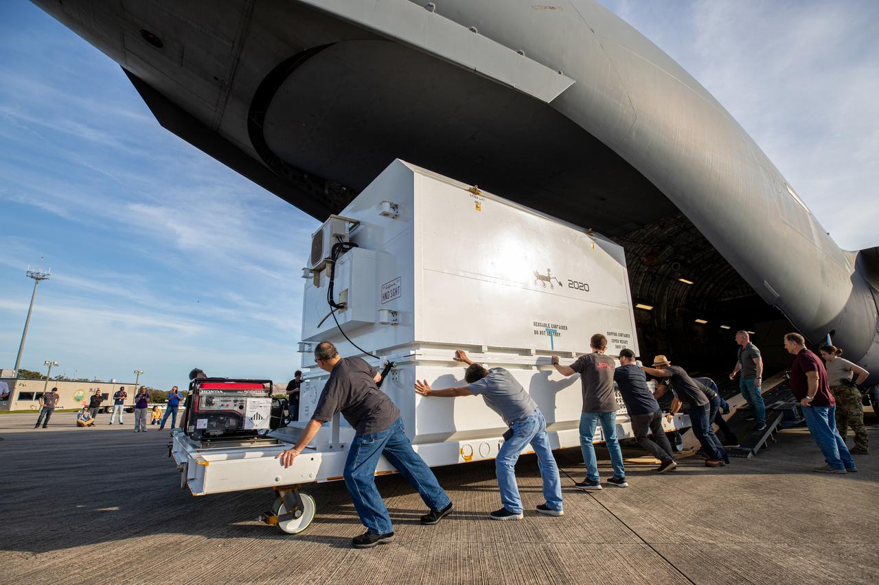The Mars 2020 rover is offloaded from a C-17 aircraft at the Launch and Landing Facility, formerly known as the Shuttle Landing Facility, at NASA’s Kennedy Space Center on Feb. 12, 2020. The rover made a cross-country trip to the Florida spaceport that started at NASA’s Jet Propulsion Laboratory in Pasadena, California. The mission, targeted for mid-July 2020, will launch aboard an Atlas V 541 rocket from Cape Canaveral Air Force Station. NASA’s Launch Services Program based at Kennedy is managing the launch.