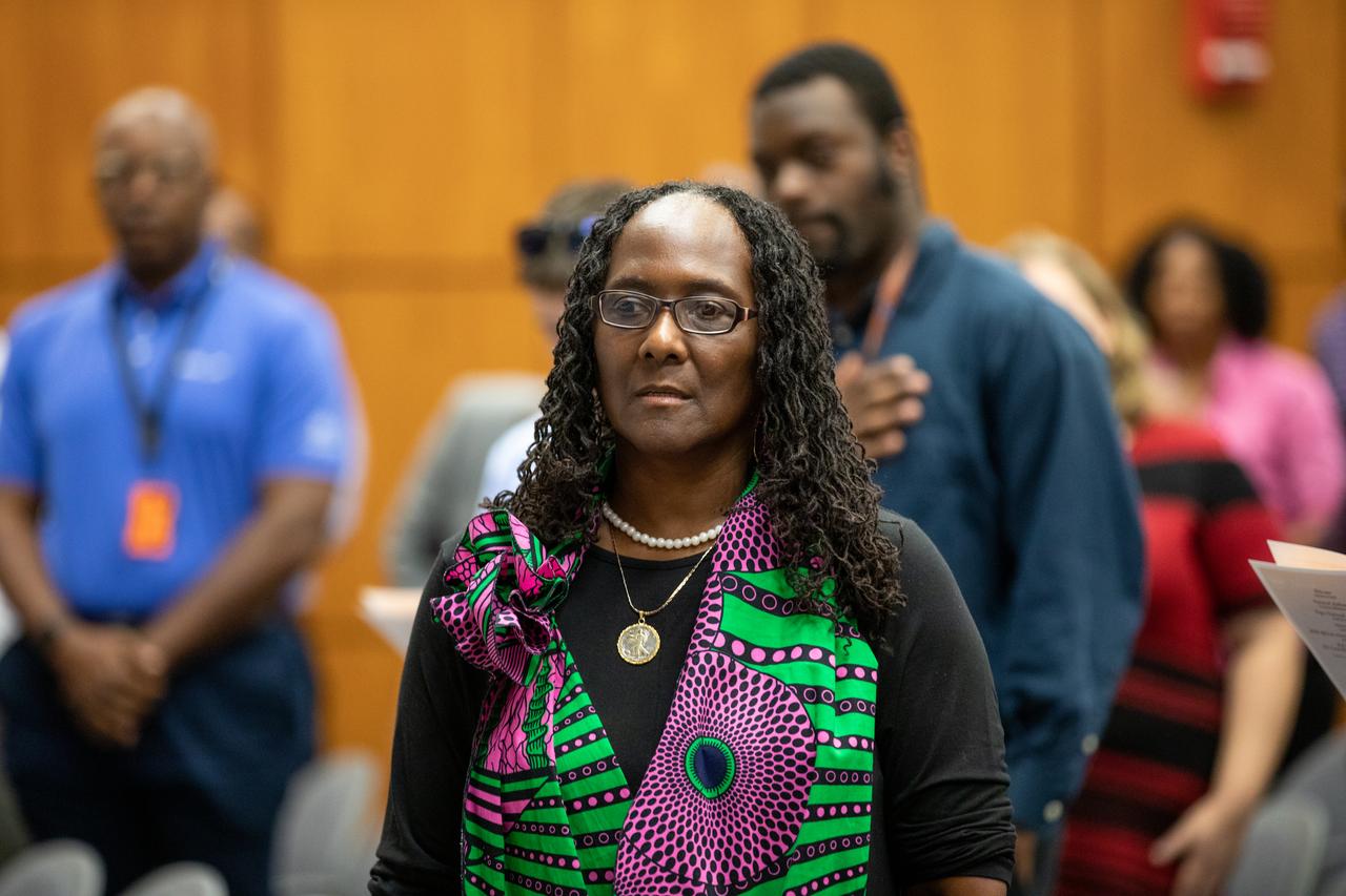 Hortense Diggs, director of Communication and Public Engagement, stands during the singing of the National Anthem at the Black History Month celebration at NASA’s Kennedy Space Center in Florida on Feb. 18, 2020. The program was organized by the Black Employee Strategy Team (BEST), one of the center’s employee resource groups. This year’s theme was “African Americans and the Vote.” Keynote speaker was James Jennings, former NASA associate administrator for Institutions and Management and Kennedy’s former deputy director. Jennings shared advice with workers and managers.