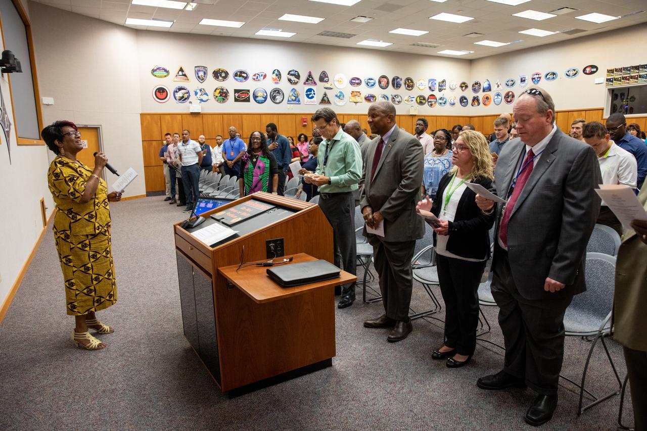 Yvonne Williams, in front, administrative assistant with Jacobs, sings the National Anthem at the start of the Black History Month celebration at NASA’s Kennedy Space Center in Florida on Feb. 18, 2020. The program was organized by the Black Employee Strategy Team (BEST), one of the center’s employee resource groups. This year’s theme was “African Americans and the Vote.” Keynote speaker was James Jennings, former NASA associate administrator for Institutions and Management and Kennedy’s former deputy director. Jennings shared advice with workers and managers.