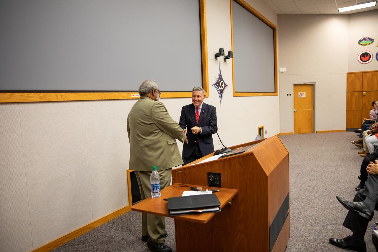 Kennedy Space Center Director Bob Cabana, at right, greets James Jennings, former NASA associate administrator for Institutions and Management and former Kennedy deputy director, during the center’s Black History Month celebration on Feb. 18, 2020. Jennings was the event’s keynote speaker. The program was organized by the Black Employee Strategy Team (BEST), one of the center’s employee resource groups. This year’s theme was “African Americans and the Vote.” Jennings shared advice with workers and managers.