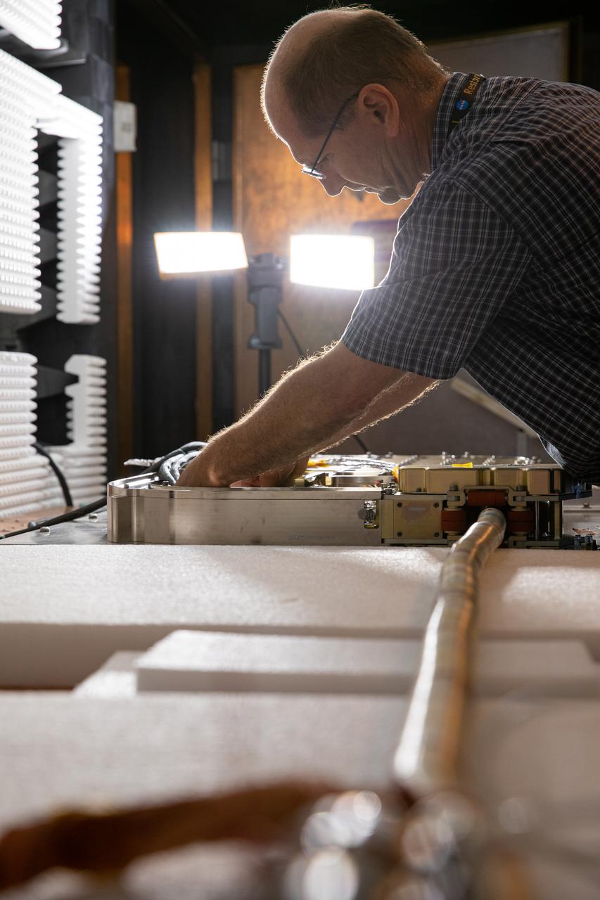 Inside the Electromagnetic Lab at NASA's Kennedy Space Center in Florida, Gabor Tamasy, Hose Management Assembly (HMA) system lead for Restore-L, prepares the HMA test unit for electromagnetic interference testing on Feb. 19, 2020. The HMA is able to extend and retract the hose, somewhat similar to the function of a tape measure. Managed by the agency's Goddard Space Flight Center in Greenbelt, Maryland, Restore-L is an inflight robotic satellite servicer spacecraft. 