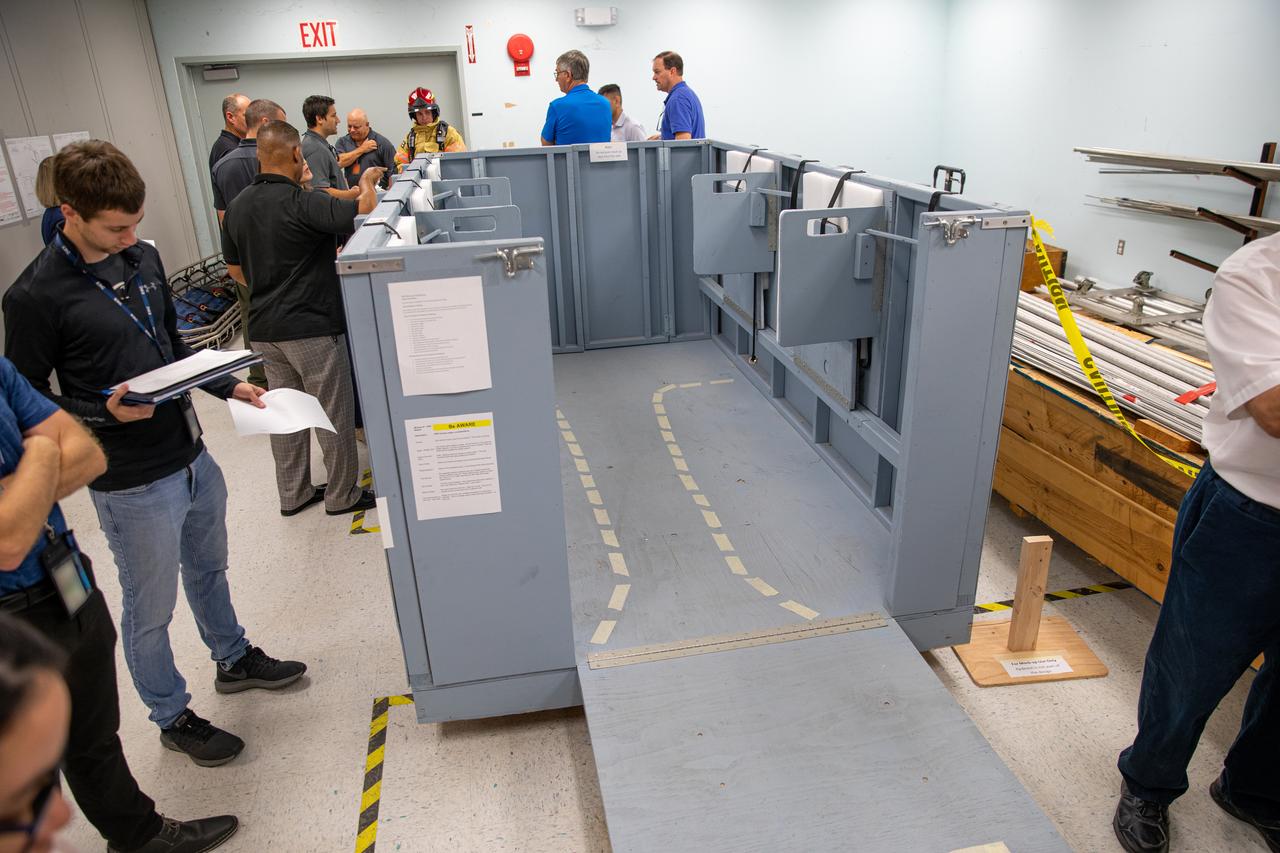 NASA Kennedy Space Center’s prime contractor Reynolds, Smith and Hill presents a mock-up of a launch pad escape basket to NASA, Kennedy Fire Rescue personnel and other stakeholders on Feb. 19, 2020. The basket would be utilized at the Florida spaceport’s Launch Pad 39B in the unlikely event of an emergency at the pad requiring evacuation during crewed missions under the Artemis Program. The actual egress basket will be designed larger than ones used during the shuttle era in order to accommodate fire rescue crew, astronauts and closeout crew. During the presentation, a fire rescue team walked through a series of trial scenarios and addressed items such as basket release location, seat depth to accommodate firefighters in full gear, sequence of loading and more.