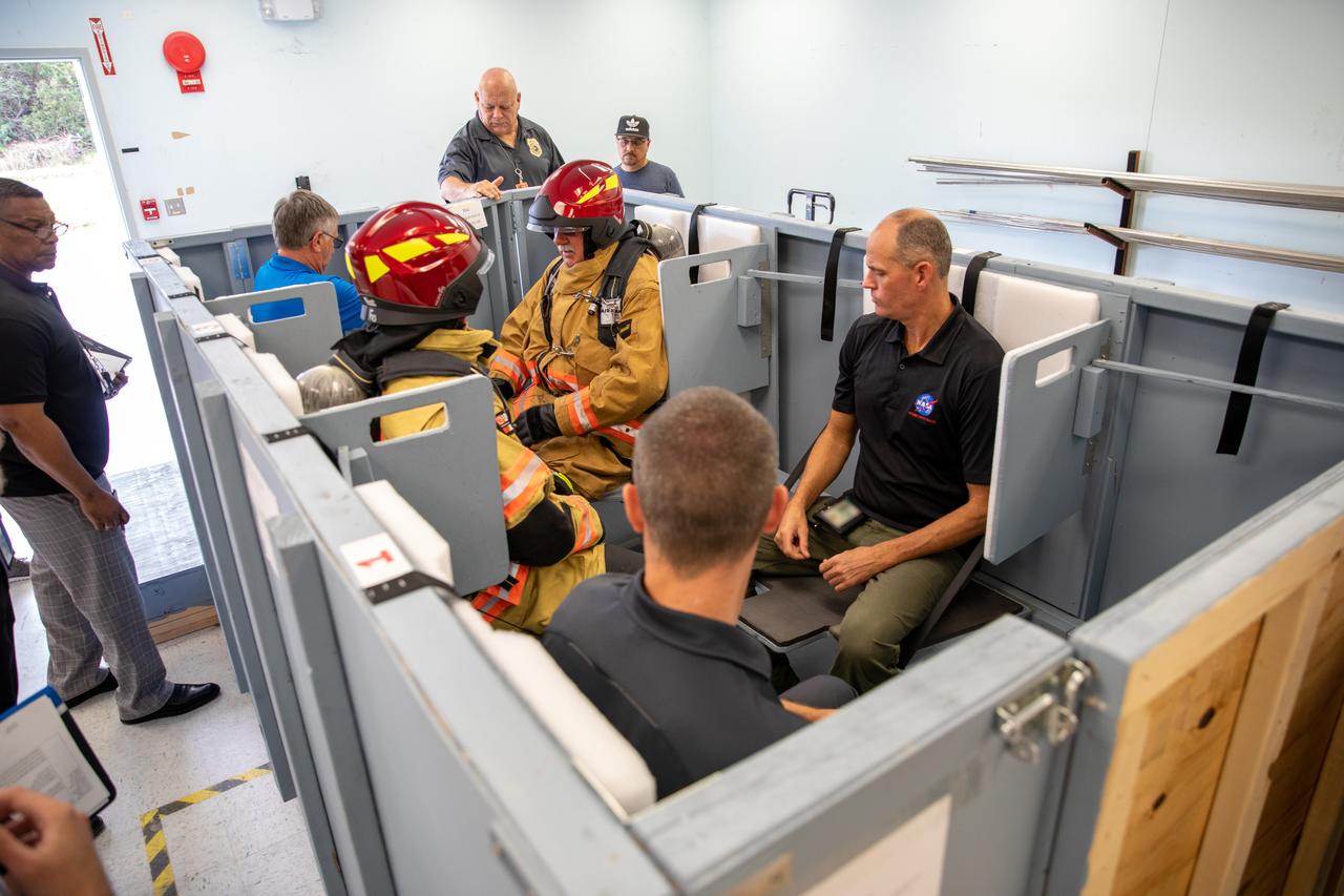 On Feb. 19, 2020, at NASA’s Kennedy Space Center in Florida, prime contractor Reynolds, Smith and Hill presents a mock-up of a launch pad escape basket to NASA, Kennedy Fire Rescue personnel and other stakeholders. The basket would be utilized at Launch Pad 39B in the unlikely event of an emergency at the pad requiring evacuation during crewed missions under the Artemis Program. The actual egress basket will be designed larger than ones used during the shuttle era in order to accommodate fire rescue crew, astronauts and closeout crew. During the presentation, a fire rescue team walked through a series of trial scenarios and addressed items such as basket release location, seat depth to accommodate firefighters in full gear, sequence of loading and more.