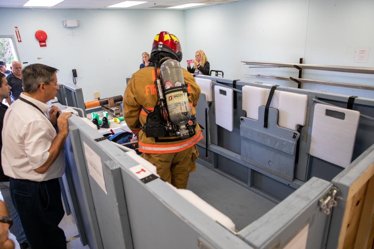 Members of NASA Kennedy Space Center’s Fire Rescue team conduct a series of trial scenarios in a mock-up of a launch pad escape basket on Feb. 19, 2020. Kennedy’s prime contractor Reynolds, Smith and Hill presented the mock-up to NASA, Kennedy Fire Rescue personnel and other stakeholders at the Florida spaceport. The basket would be utilized at Launch Pad 39B in the unlikely event of an emergency at the pad requiring evacuation during crewed missions under the Artemis Program. The actual egress basket will be designed larger than ones used during the shuttle era in order to accommodate fire rescue crew, astronauts and closeout crew. During the presentation, items such as basket release location, seat depth to accommodate firefighters in full gear, sequence of loading and more were addressed. Engineers will take what they learned during this presentation and discussion to advance the design of the pad egress system.