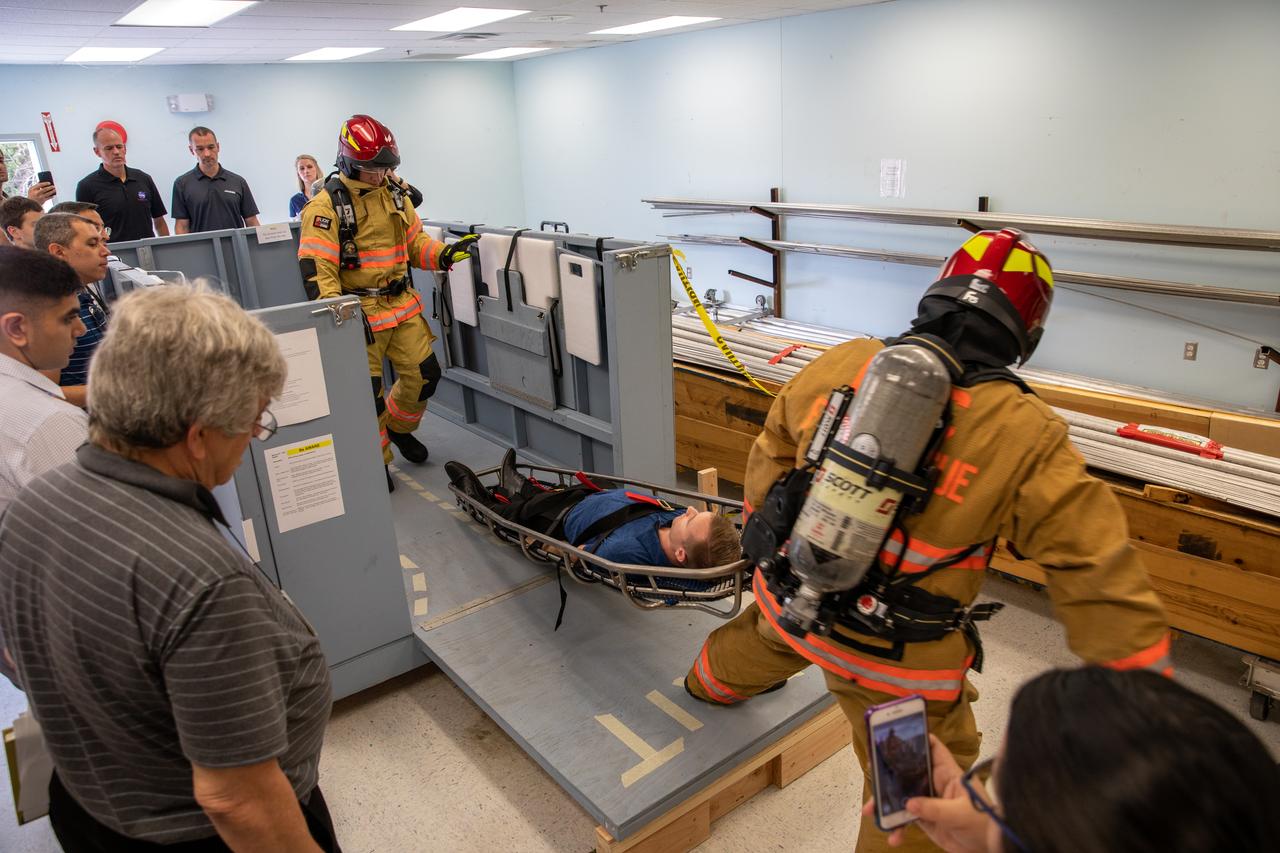 Members of NASA Kennedy Space Center’s Fire Rescue team conduct a series of trial scenarios in a mock-up of a launch pad escape basket on Feb. 19, 2020. Kennedy’s prime contractor Reynolds, Smith and Hill presented the mock-up to NASA, Kennedy Fire Rescue personnel and other stakeholders at the Florida spaceport. The basket would be utilized at Launch Pad 39B in the unlikely event of an emergency at the pad requiring evacuation during crewed missions under the Artemis Program. The actual egress basket will be designed larger than ones used during the shuttle era in order to accommodate fire rescue crew, astronauts and closeout crew. During the presentation, items such as basket release location, seat depth to accommodate firefighters in full gear, sequence of loading and more were addressed. Engineers will take what they learned during this presentation and discussion to advance the design of the pad egress system.