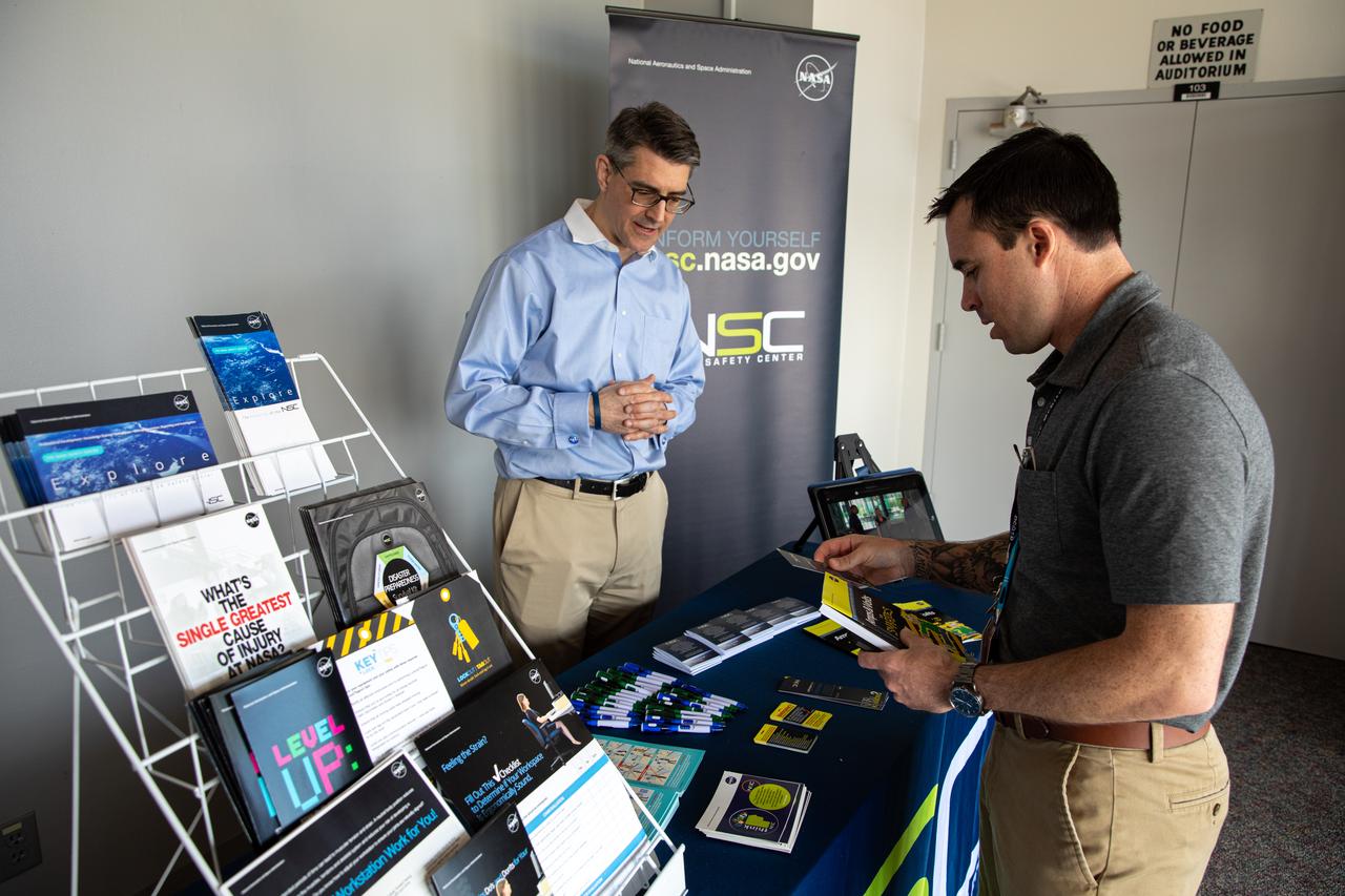 Chas Hoff, a public affairs official from NASA’s Goddard Space Flight Center, provides information on the NASA Safety Center to a Kennedy Space Center employee in the Florida spaceport’s Training Auditorium on March 2, 2020. Hoff had an informational table set up during the center’s annual Safety and Health Days, which took place March 2 through March 6. Throughout the week, Kennedy employees had the opportunity to attend a variety of presentations – all of which focused on how to maintain a safe and healthy workforce.