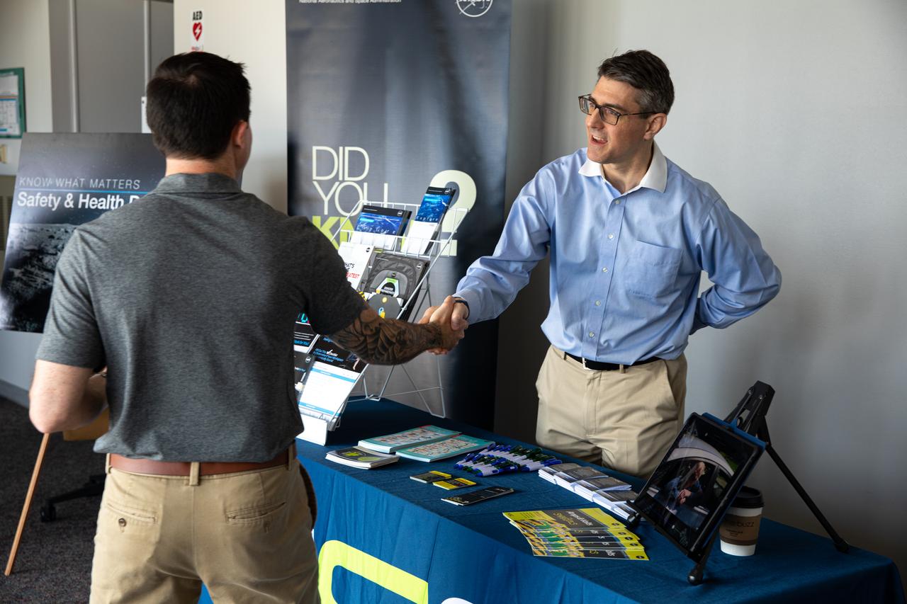 Chas Hoff, a public affairs official from NASA’s Goddard Space Flight Center, provides information on the NASA Safety Center to a Kennedy Space Center employee in the Florida spaceport’s Training Auditorium on March 2, 2020. Hoff had an informational table set up during the center’s annual Safety and Health Days, which took place March 2 through March 6. Throughout the week, Kennedy employees had the opportunity to attend a variety of presentations – all of which focused on how to maintain a safe and healthy workforce.