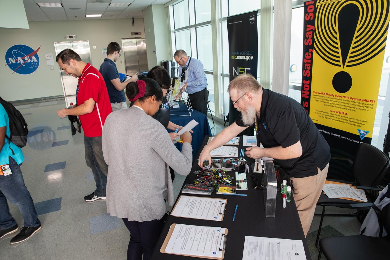 NASA Kennedy Space Center employees learn more about safety from informational tables set up inside the Florida spaceport’s Operations Support Building II on March 3, 2020, during the center’s annual Safety and Health Days. Taking place March 2 through March 6, Safety and Health Days provides Kennedy employees with a variety of presentations to attend – all of which focus on how to maintain a safe and healthy workforce.