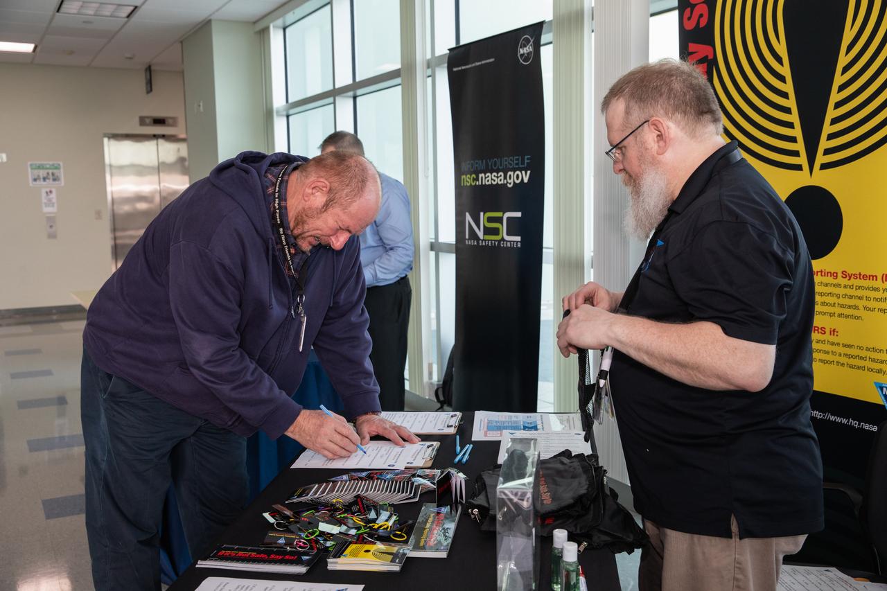 A NASA Kennedy Space Center employee learns more about safety from informational tables set up inside the Florida spaceport’s Operations Support Building II on March 3, 2020, during the center’s annual Safety and Health Days. Taking place March 2 through March 6, Safety and Health Days provides Kennedy employees with a variety of presentations to attend – all of which focus on how to maintain a safe and healthy workforce.