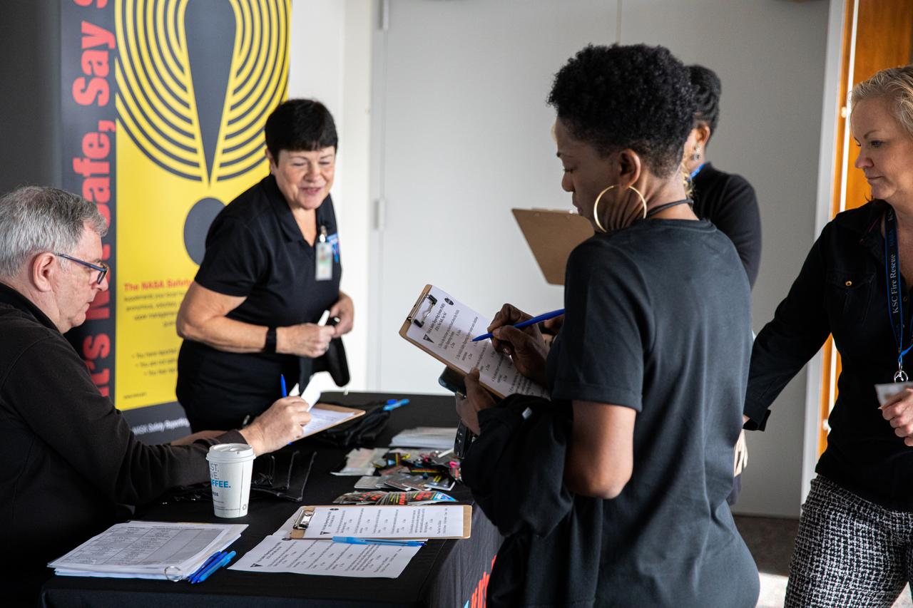 NASA Kennedy Space Center employees learn more about safety from an informational table set up inside the Florida spaceport’s Training Auditorium on March 4, 2020, during the center’s annual Safety and Health Days. Taking place March 2 through March 6, Safety and Health Days provides Kennedy employees with a variety of presentations to attend – all of which focus on how to maintain a safe and healthy workforce.