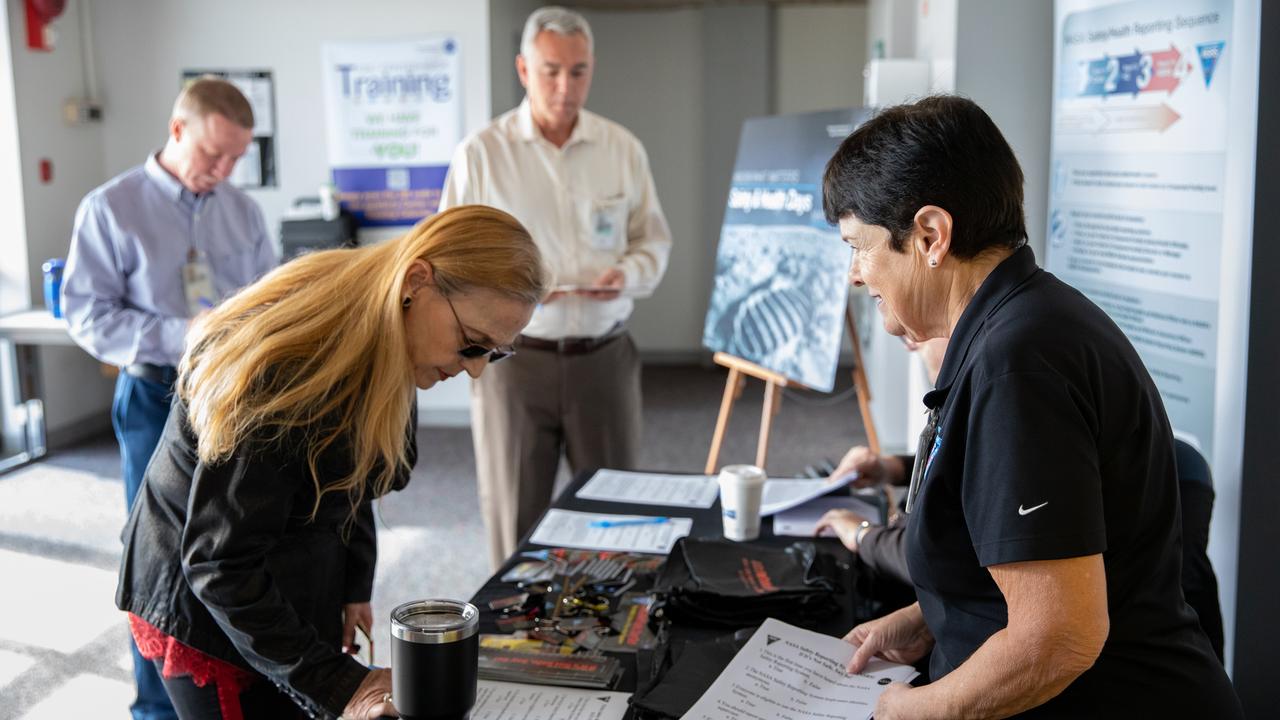 NASA Kennedy Space Center employees learn more about safety from an informational table set up inside the Florida spaceport’s Training Auditorium on March 4, 2020, during the center’s annual Safety and Health Days. Taking place March 2 through March 6, Safety and Health Days provides Kennedy employees with a variety of presentations to attend – all of which focus on how to maintain a safe and healthy workforce.