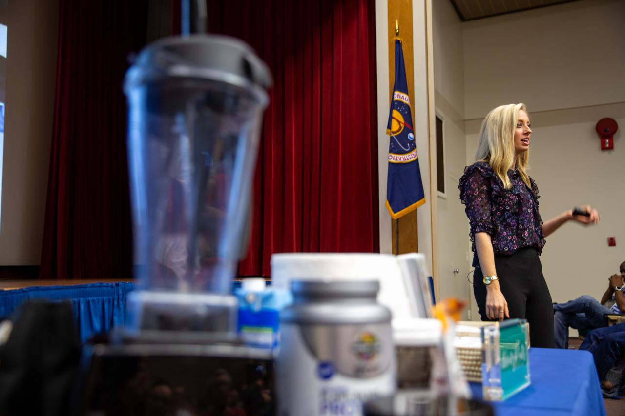 Carly Paige, an integrative nutrition health coach and chef, speaks to Kennedy Space Center employees inside the Florida spaceport’s Training Auditorium on March 5, 2020, during the center’s annual Safety and Health Days. Taking place March 2 through March 6, Safety and Health Days provides Kennedy employees with a variety of presentations to attend – all of which focus on how to maintain a safe and healthy workforce. Paige’s presentation included information on simple swaps that can be made to incorporate healthier habits on a daily basis.