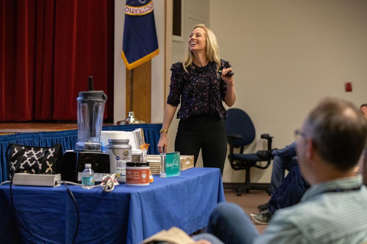 Carly Paige, an integrative nutrition health coach and chef, speaks to Kennedy Space Center employees inside the Florida spaceport’s Training Auditorium on March 5, 2020, during the center’s annual Safety and Health Days. Taking place March 2 through March 6, Safety and Health Days provides Kennedy employees with a variety of presentations to attend – all of which focus on how to maintain a safe and healthy workforce. Paige’s presentation included information on simple swaps that can be made to incorporate healthier habits on a daily basis.