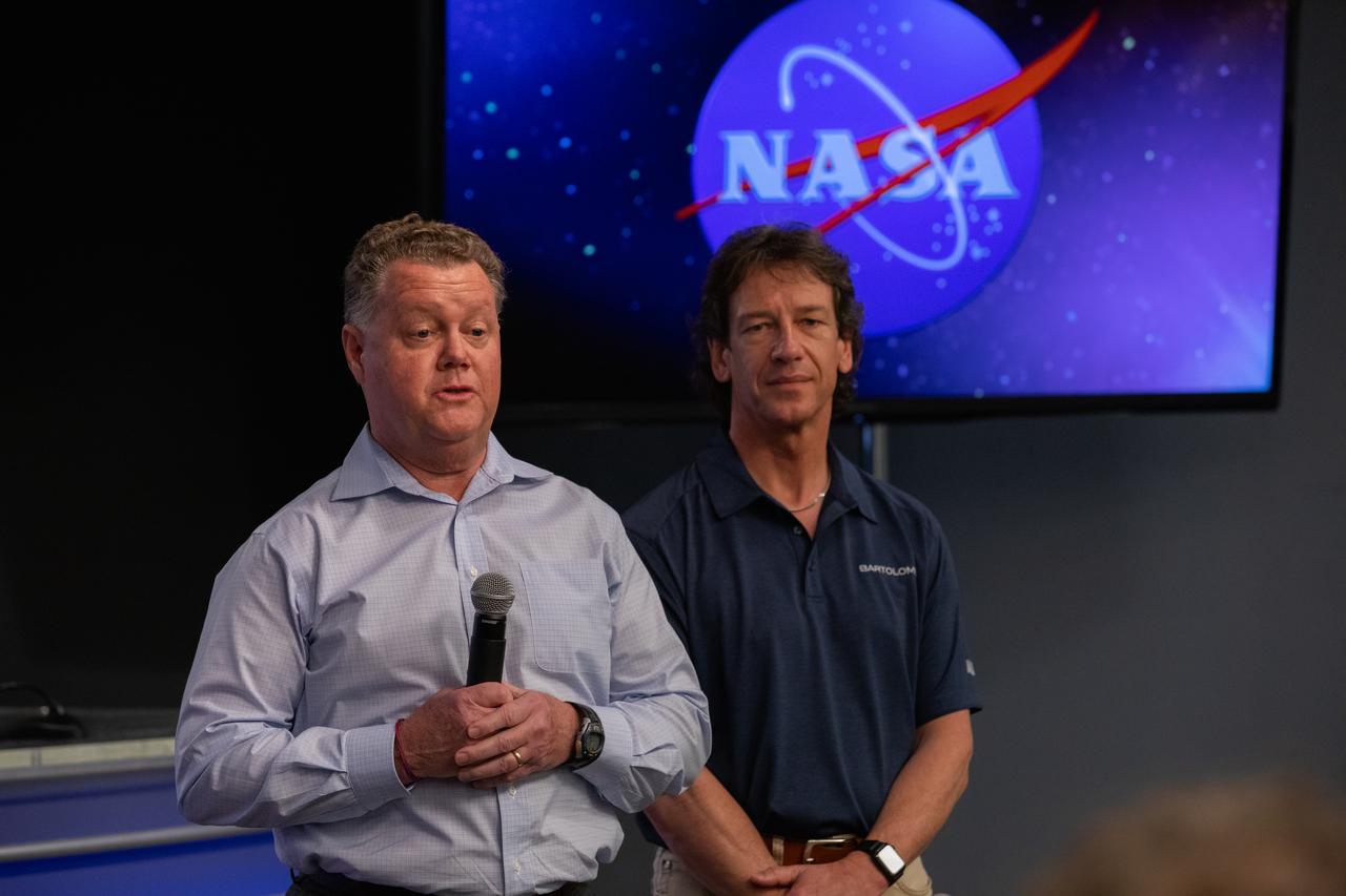 Bill Corely, left, director of business development for Airbus Defence and Space, and Andreas Schütte, Bartolomeo project manager, address NASA Social participants during a What’s on Board science briefing at the agency’s Kennedy Space Center in Florida on March 5, 2020. The briefing provided a closer look at some of the payloads launching on SpaceX’s 20th Commercial Resupply Services (CRS-20) mission to the International Space Station. The company’s Falcon 9 rocket is scheduled to lift off from Cape Canaveral Air Force Station’s Space Launch Complex 40 at 11:50 p.m. EST on March 6, 2020.