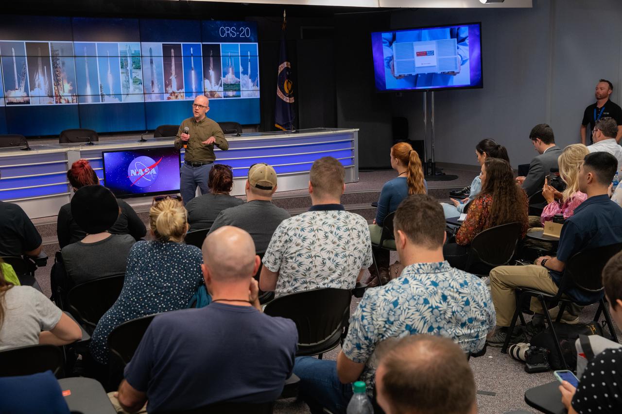 Aaron Beeler, professor of chemistry at Boston University and principal investigator of the Flow Chemistry Platform for Synthetic Reactions on ISS study, addresses NASA Social participants during a What’s on Board science briefing at the agency’s Kennedy Space Center in Florida on March 5, 2020. The briefing provided a closer look at some of the payloads launching on SpaceX’s 20th Commercial Resupply Services (CRS-20) mission to the International Space Station. The company’s Falcon 9 rocket is scheduled to lift off from Cape Canaveral Air Force Station’s Space Launch Complex 40 at 11:50 p.m. EST on March 6, 2020.