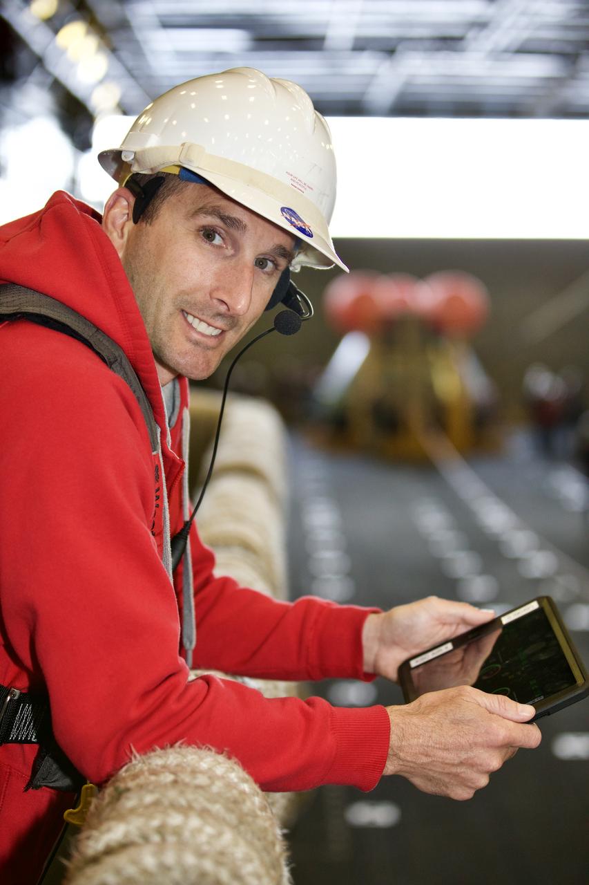 Jeremy Parr participates in  the training of new Landing and Recovery team members  during Underway Recovery Test-8.  NASA is preparing for an Orion splashdown in the Pacific Ocean after Artemis I.