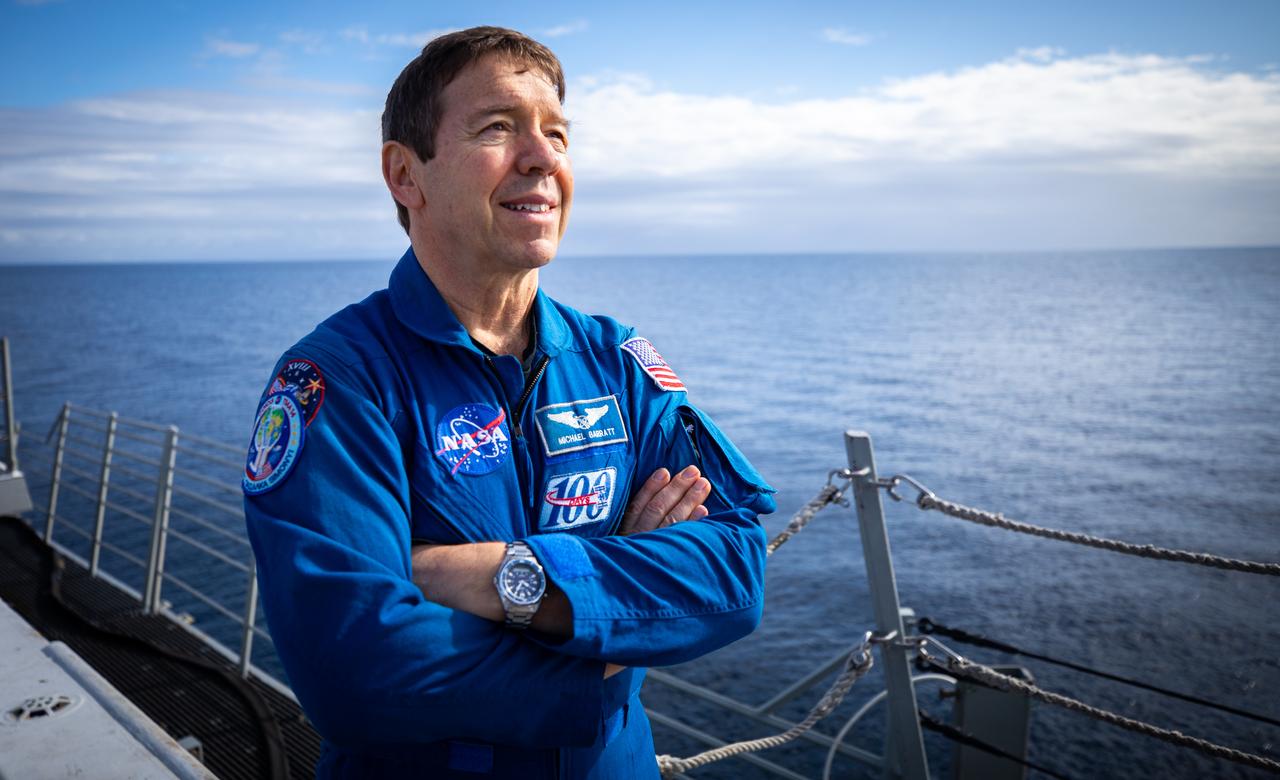 Astronaut Michael Barratt observes Underway Recovery Test-8 aboard the USS John P. Murtha. During the test, NASA’s Landing and Recovery Team practiced bringing Orion into the well deck of the ship to ensure recovery procedure timelines are validated as NASA plans to send Artemis I around the Moon and splashdown in the Pacific Ocean.