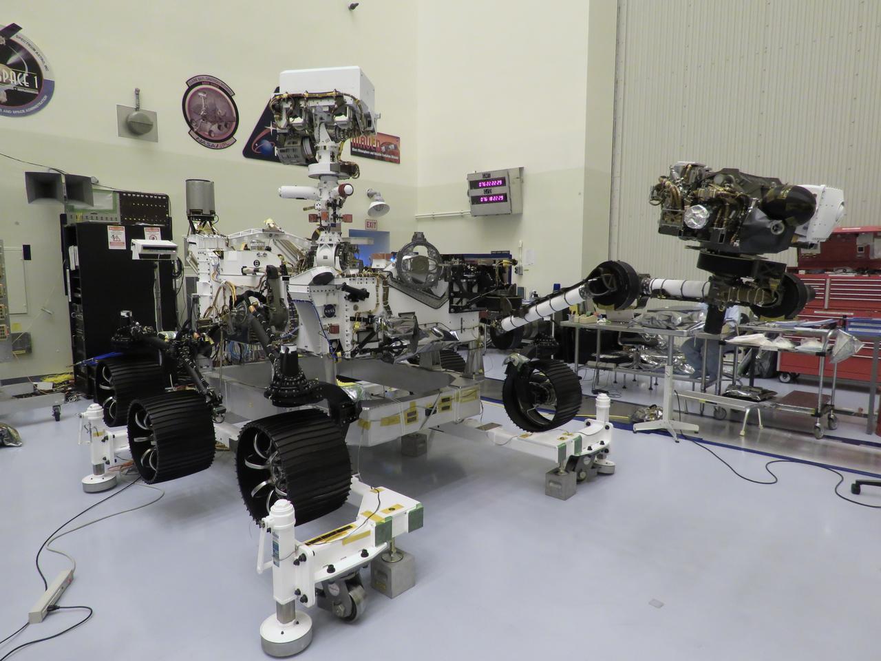 The “Send Your Name to Mars” logo is installed on the Mars Perseverance rover on March 16, 2020, inside the Payload Hazardous Servicing Facility at NASA’s Kennedy Space Center in Florida. When the rover lands on the Red Planet on Feb. 18, 2021, it will be carrying the names of more than 10 million people throughout the world. Those names were etched onto a microchip, which was placed aboard Perseverance. Liftoff aboard a United Launch Alliance Atlas V 541 rocket is targeted for mid-July from Cape Canaveral Air Force Station. NASA’s Launch Services Program based at Kennedy is managing the launch.