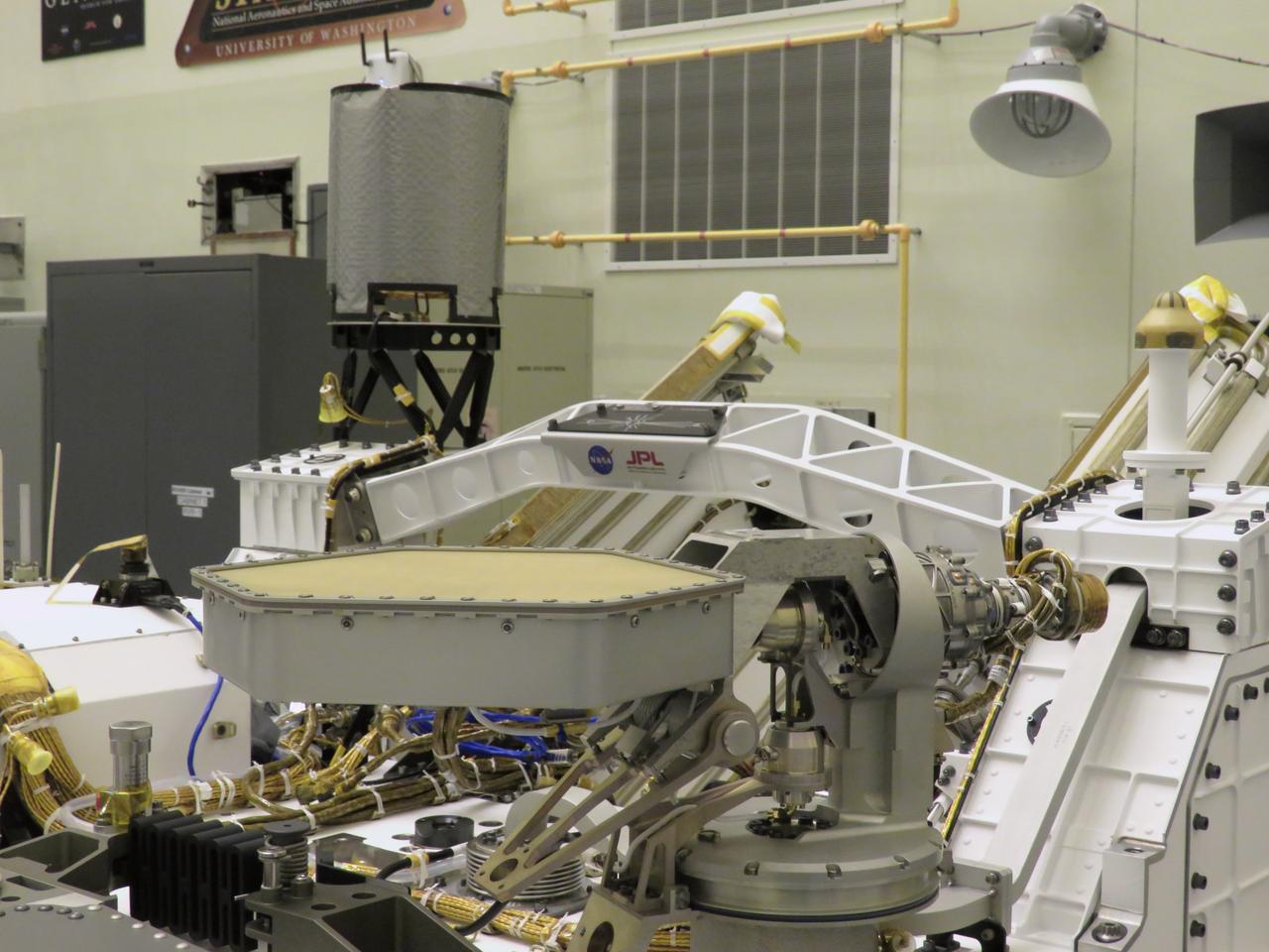 The “Send Your Name to Mars” logo is installed on the Mars Perseverance rover on March 16, 2020, inside the Payload Hazardous Servicing Facility at NASA’s Kennedy Space Center in Florida. When the rover lands on the Red Planet on Feb. 18, 2021, it will be carrying the names of more than 10 million people throughout the world. Those names were etched onto a microchip, which was placed aboard Perseverance. Liftoff aboard a United Launch Alliance Atlas V 541 rocket is targeted for mid-July from Cape Canaveral Air Force Station. NASA’s Launch Services Program based at Kennedy is managing the launch.