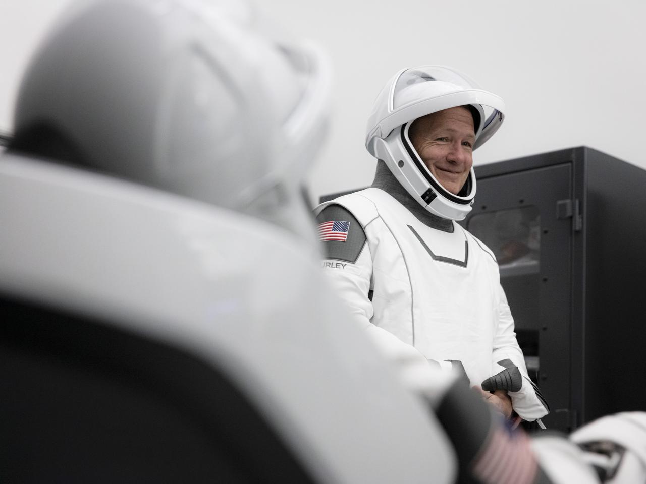 On Thursday, March 19 and Friday, March 20, SpaceX teams in Firing Room 4 at NASA's Kennedy Space Center in Florida and the company's Mission Control in Hawthorne, California, along with NASA flight controllers in Mission Control Houston, executed a full simulation of launch and docking of the Crew Dragon spacecraft, with NASA astronauts Bob Behnken and Doug Hurley participating in SpaceX's flight simulator. 