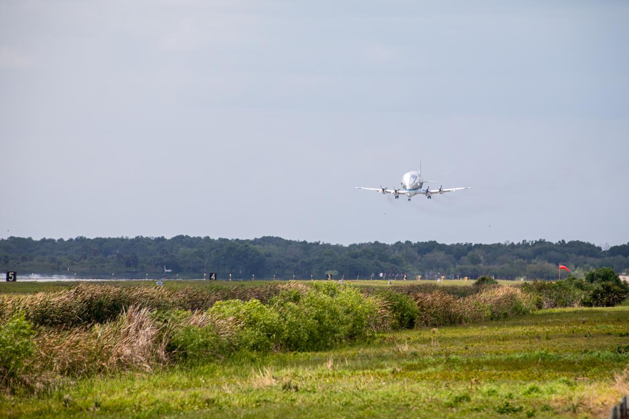 NASA’s Super Guppy aircraft, carrying the Orion spacecraft, lands at the Launch and Landing Facility runway at Kennedy Space Center in Florida on March 25, 2020. Orion has returned to Kennedy after testing at the agency’s Plum Brook Station in Ohio verified the spacecraft can handle the extreme conditions of a deep-space environment. The spacecraft will now undergo final testing and assembly prior to being integrated with the Space Launch System rocket. Orion will fly on the agency’s Artemis I mission – the first in a series of increasingly complex missions to the Moon that will ultimately lead to the exploration of Mars.