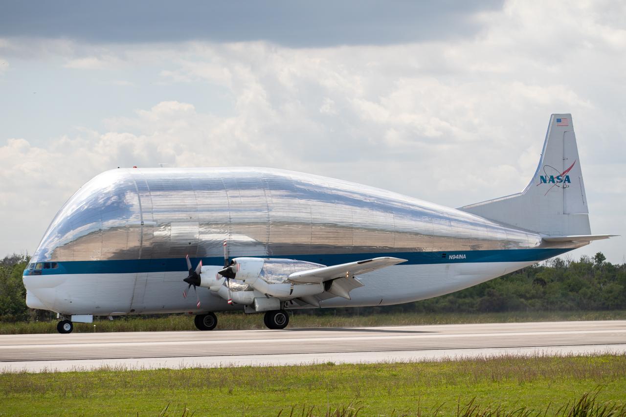 NASA’s Super Guppy aircraft, carrying the Orion spacecraft, lands at the Launch and Landing Facility runway at Kennedy Space Center in Florida on March 25, 2020. Orion has returned to Kennedy after testing at the agency’s Plum Brook Station in Ohio verified the spacecraft can handle the extreme conditions of a deep-space environment. The spacecraft will now undergo final testing and assembly prior to being integrated with the Space Launch System rocket. Orion will fly on the agency’s Artemis I mission – the first in a series of increasingly complex missions to the Moon that will ultimately lead to the exploration of Mars.