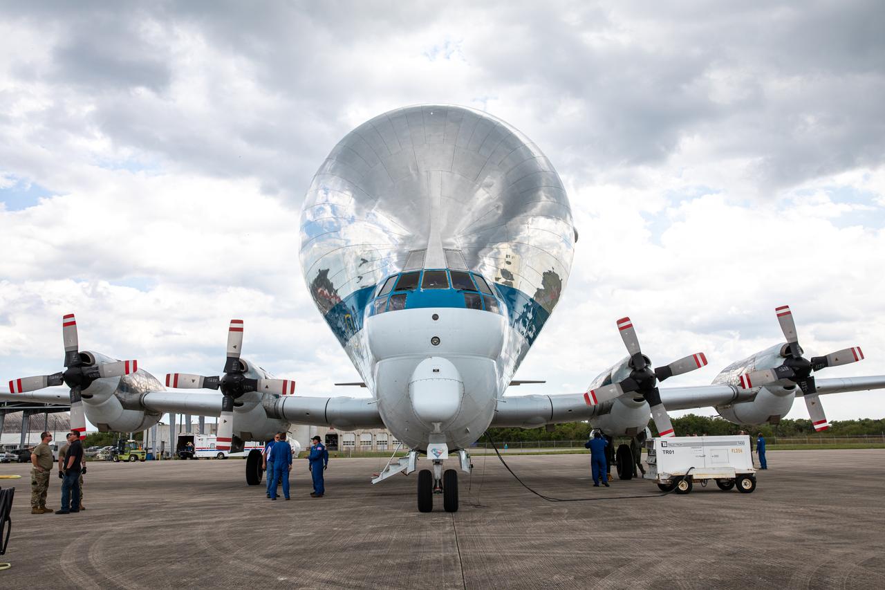 NASA’s Super Guppy aircraft, carrying the Orion spacecraft, lands at the Launch and Landing Facility runway at Kennedy Space Center in Florida on March 25, 2020. Orion has returned to Kennedy after testing at the agency’s Plum Brook Station in Ohio verified the spacecraft can handle the extreme conditions of a deep-space environment. The spacecraft will now undergo final testing and assembly prior to being integrated with the Space Launch System rocket. Orion will fly on the agency’s Artemis I mission – the first in a series of increasingly complex missions to the Moon that will ultimately lead to the exploration of Mars.
