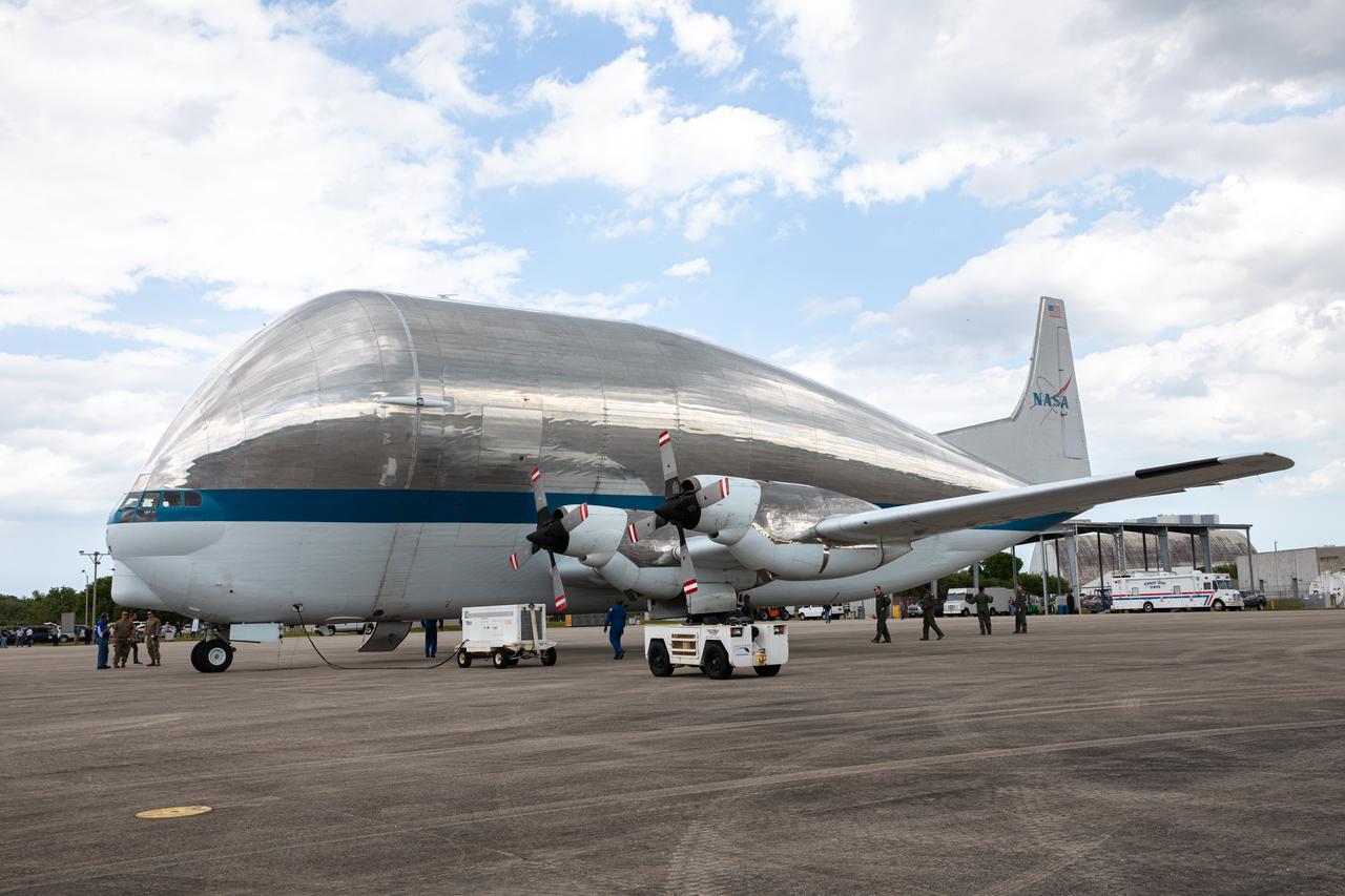 NASA’s Super Guppy aircraft, carrying the Orion spacecraft, lands at the Launch and Landing Facility runway at Kennedy Space Center in Florida on March 25, 2020. Orion has returned to Kennedy after testing at the agency’s Plum Brook Station in Ohio verified the spacecraft can handle the extreme conditions of a deep-space environment. The spacecraft will now undergo final testing and assembly prior to being integrated with the Space Launch System rocket. Orion will fly on the agency’s Artemis I mission – the first in a series of increasingly complex missions to the Moon that will ultimately lead to the exploration of Mars.