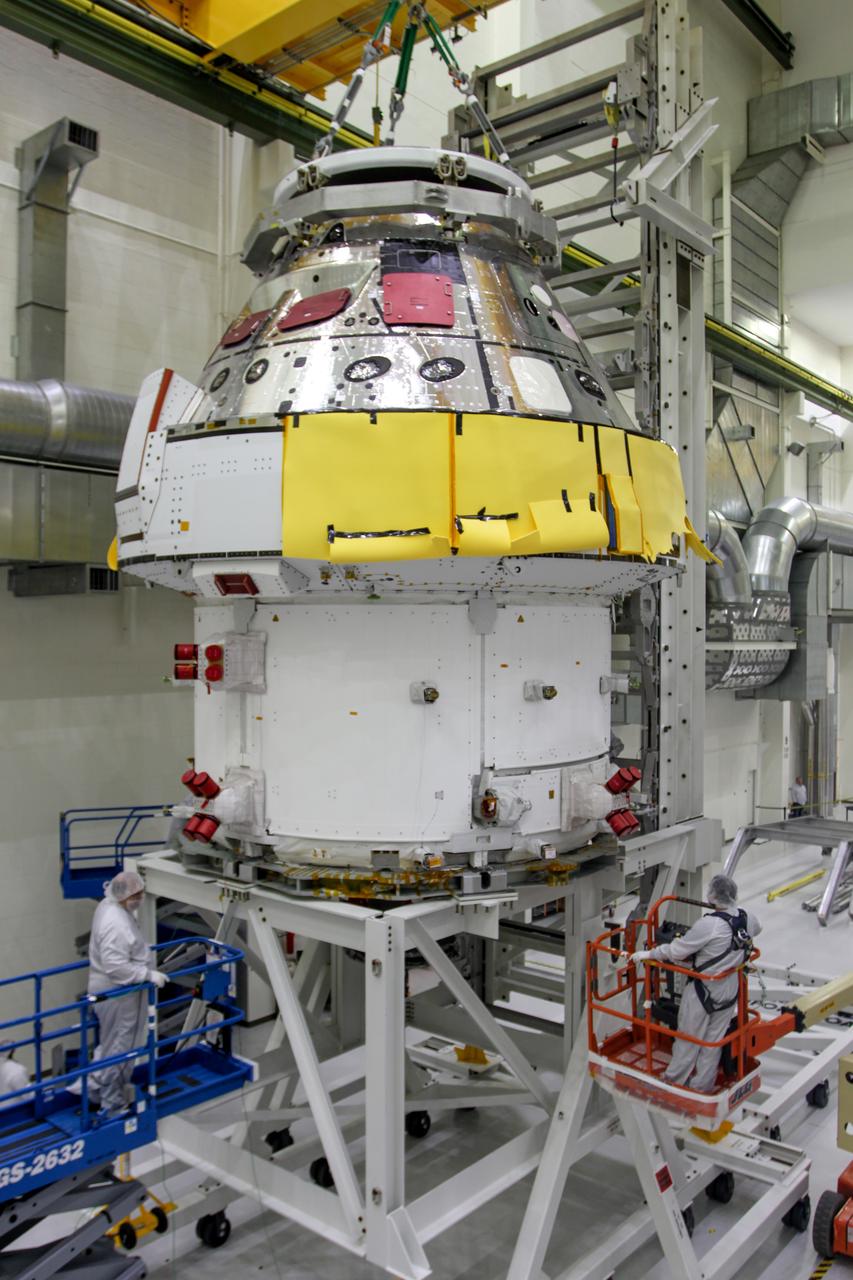 The Orion spacecraft is moved to the Final Assembly and Systems Test cell at Kennedy Space Center. The spacecraft returned from Ohio after a successful series of environmental test at Glenn Research Center's Plum Brook Station.
