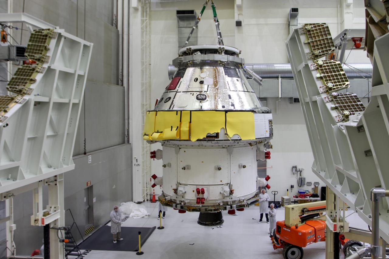 The Orion spacecraft is moved to the Final Assembly and Systems Test cell at Kennedy Space Center. The spacecraft returned from Ohio after a successful series of environmental test at Glenn Research Center's Plum Brook Station.